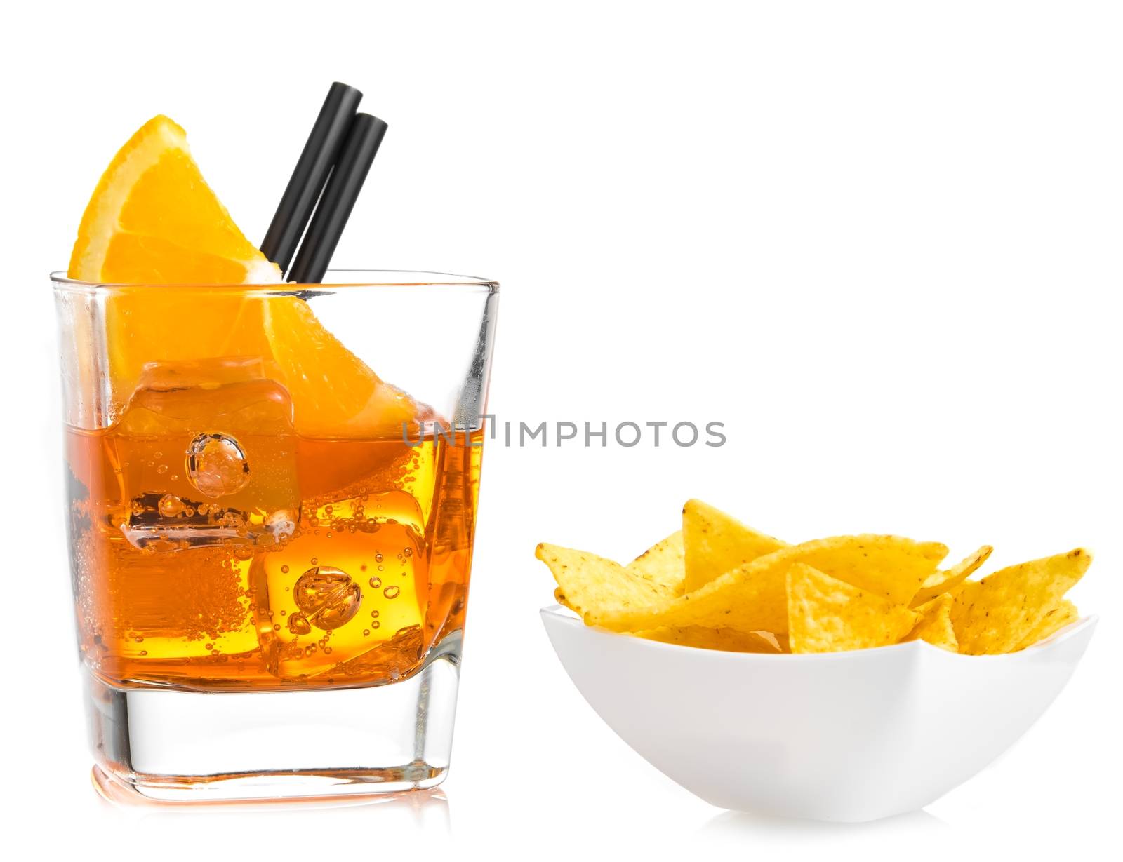 hot tacos chips in front of glass of spritz aperitif aperol cocktail with orange slices and ice cubes on white background