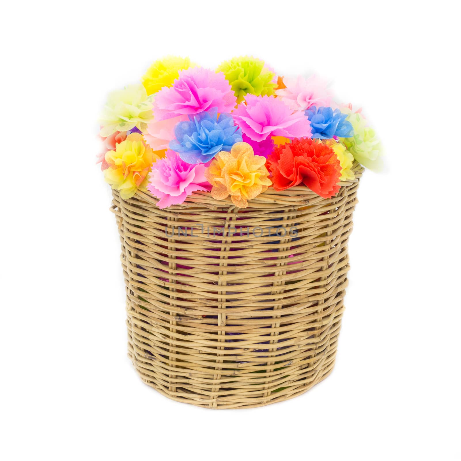 Bright flowers in basket isolated on white by powerbeephoto