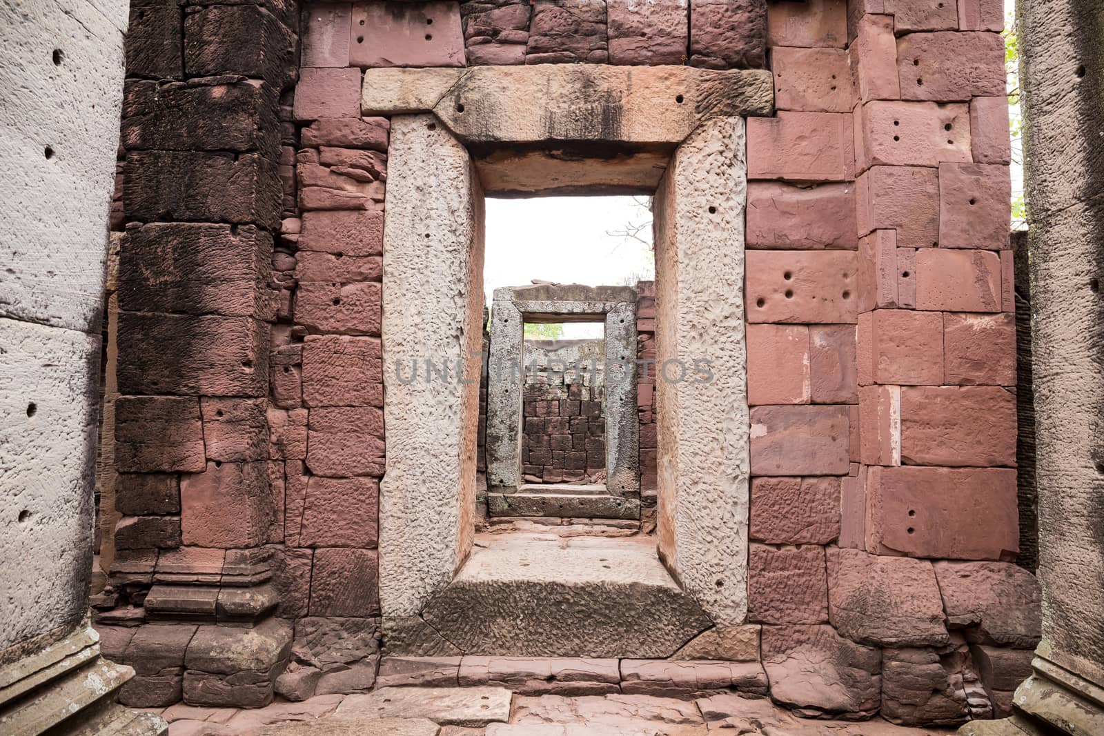 stone door ancient in castle, pimai castle, historical park and ancient castle in nakhon ratchasima thailand, sandstone (focus inside door)