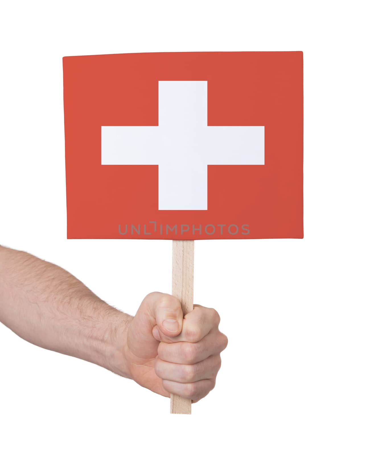 Hand holding small card, isolated on white - Flag of Switzerland