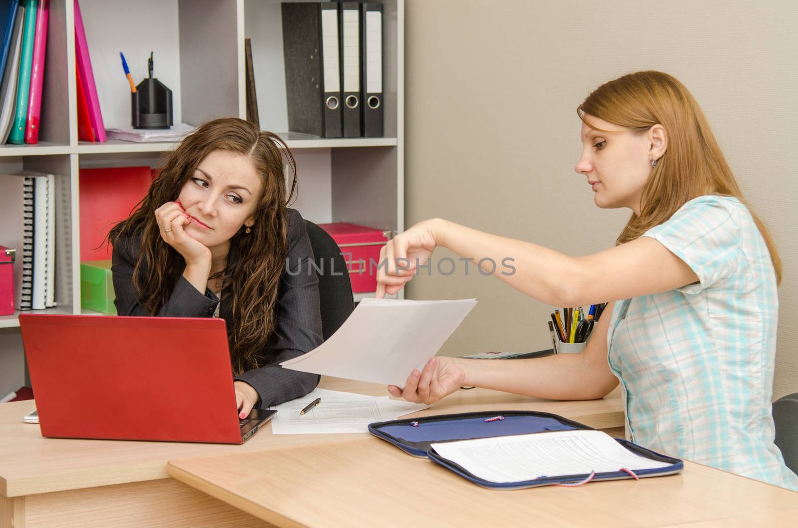Young beautiful girl on reception at the office specialist