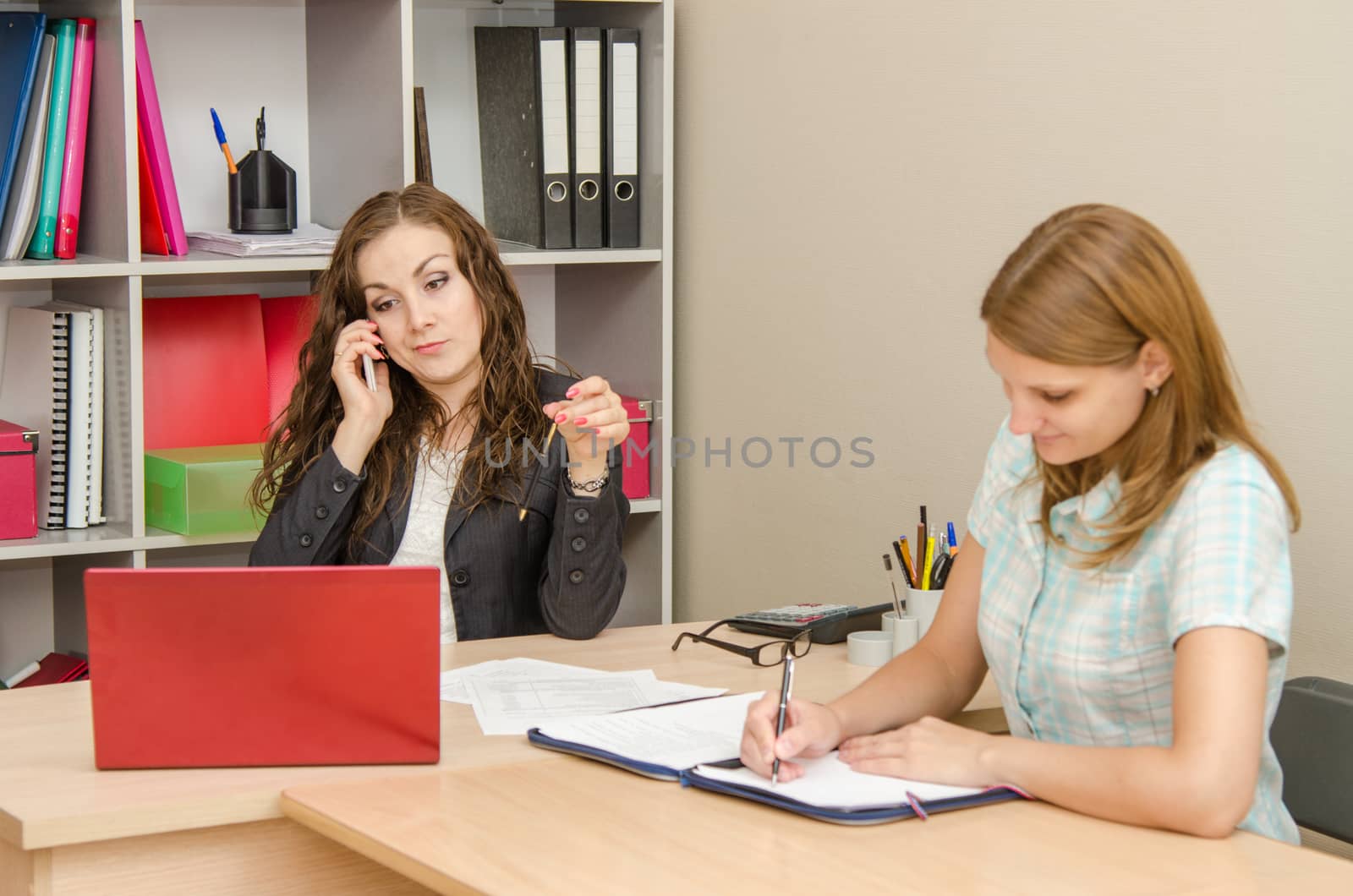 Young beautiful girl on reception at the office specialist