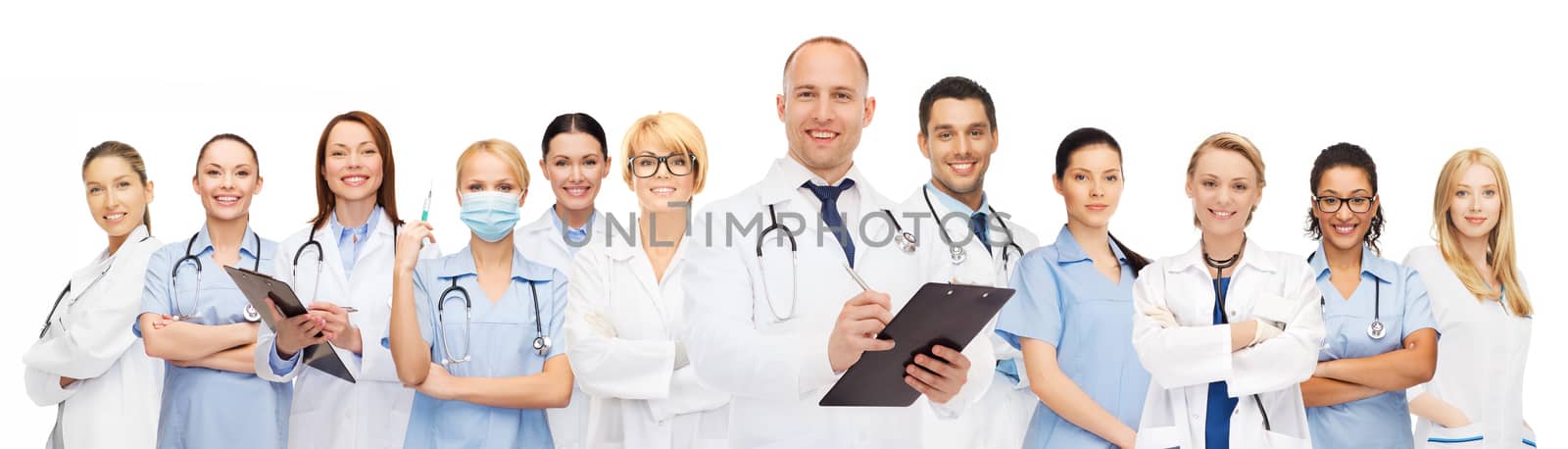 group of smiling doctors with clipboard by dolgachov