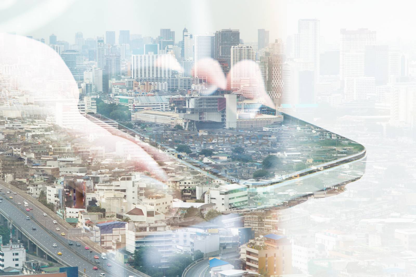 Double exposure image of people with smart phone and cityscape background.