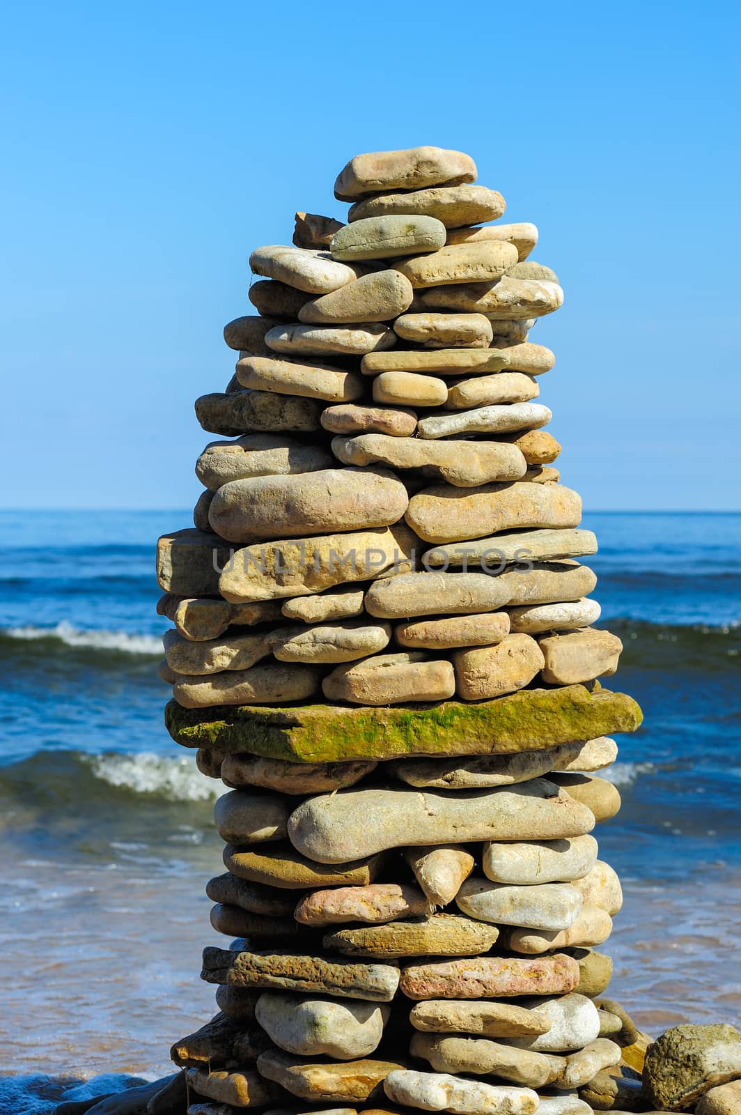 Stones laid out in the form of a tower on the coast