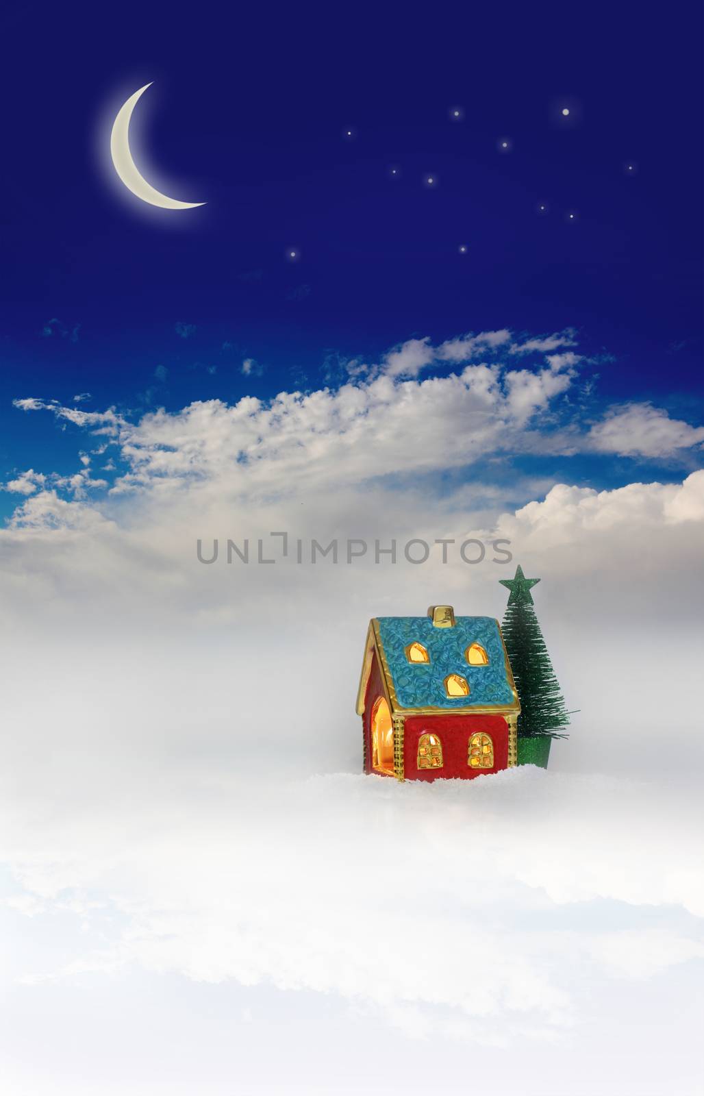 Christmas festive light in house under blue sky by rudchenko