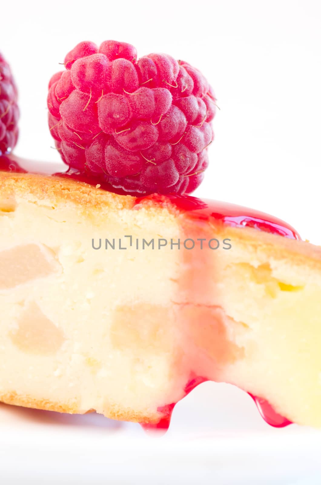 cake with raspberries and cream cheese decorated with fresh rasp by dolnikow