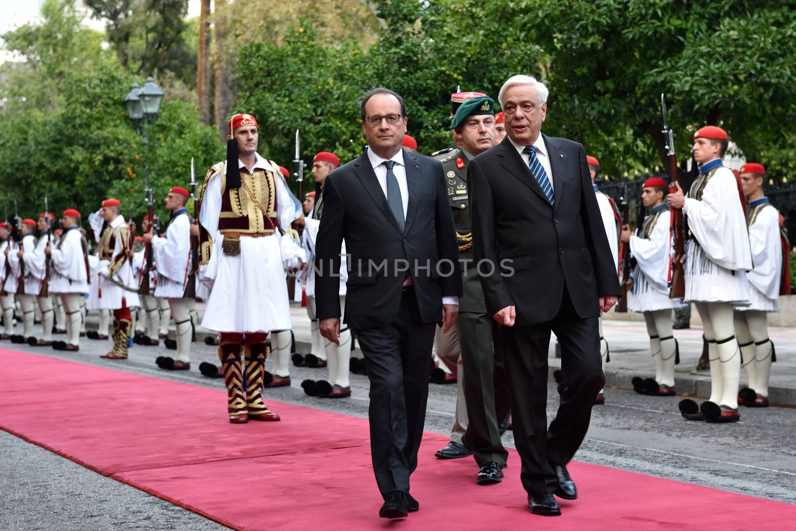 GREECE, Athens: French President Francois Hollande (center) visits Hellenic President Prokopis Pavlopoulos (right) at the Presidential Palace in Athens, Greece on October 22, 2015 to explore avenues for debt relief.