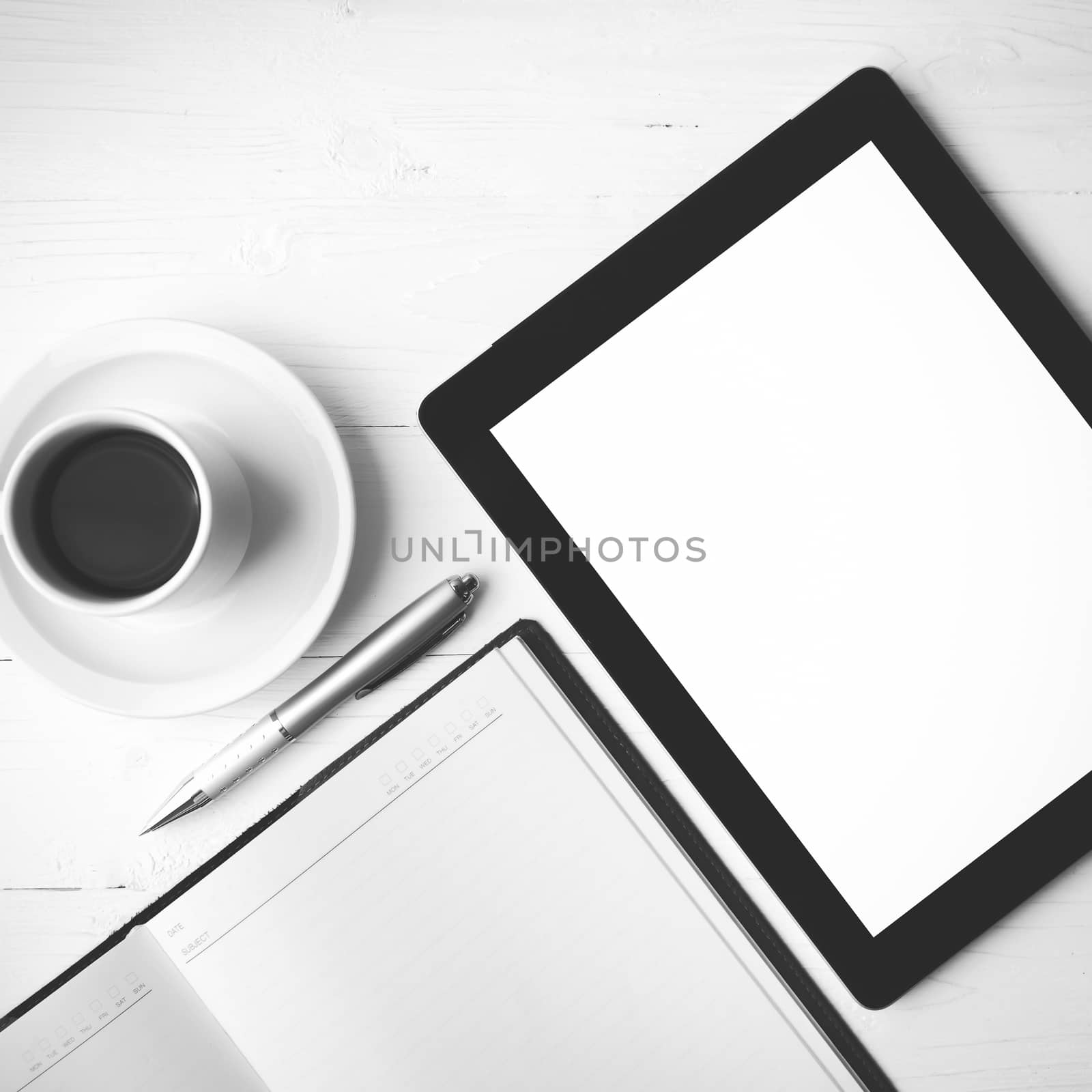 tablet with notebook and coffee cup black and white color style by ammza12