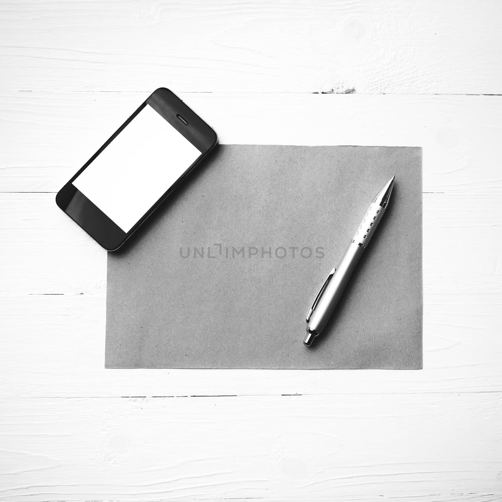 cellphone with brown paper and pen black and white color style by ammza12