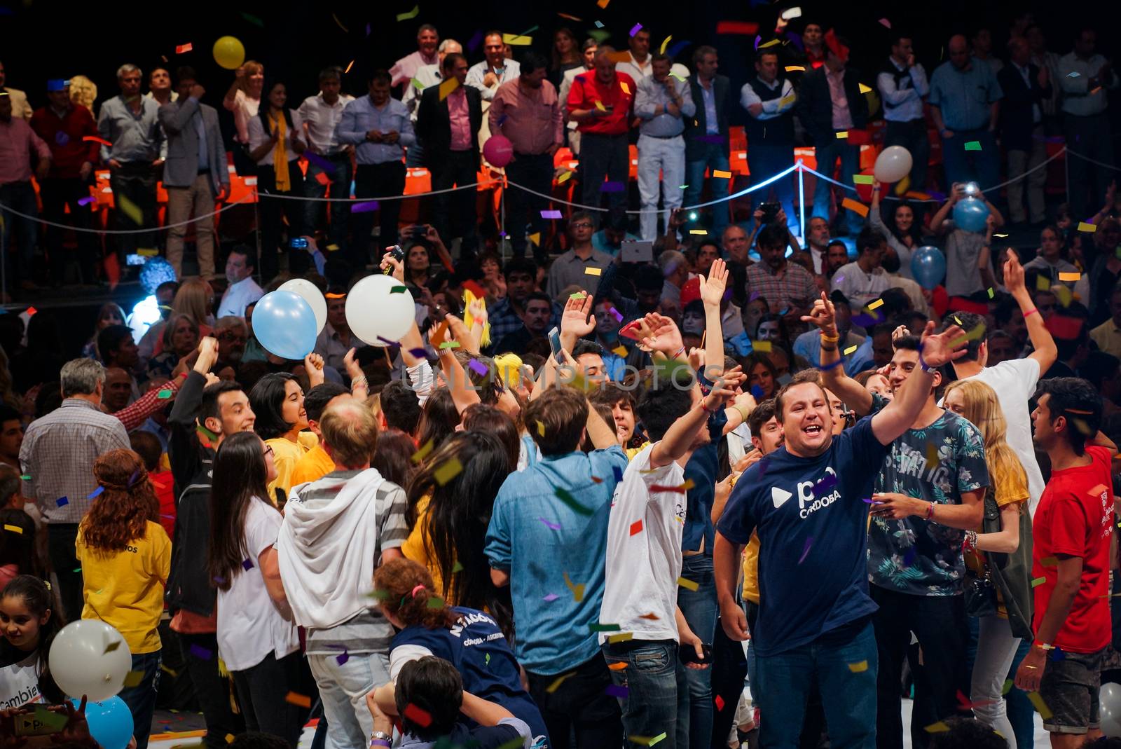 ARGENTINA, Cordoba: Supporters cheer as Mauricio Macri, outgoing mayor of Buenos Aires and presidential candidate from the opposition Cambiemos ('Let's change') party, speaks at a final campaign rally in Cordoba, Argentina on October 22, 2015. Argentina's general election will take place on October 25.