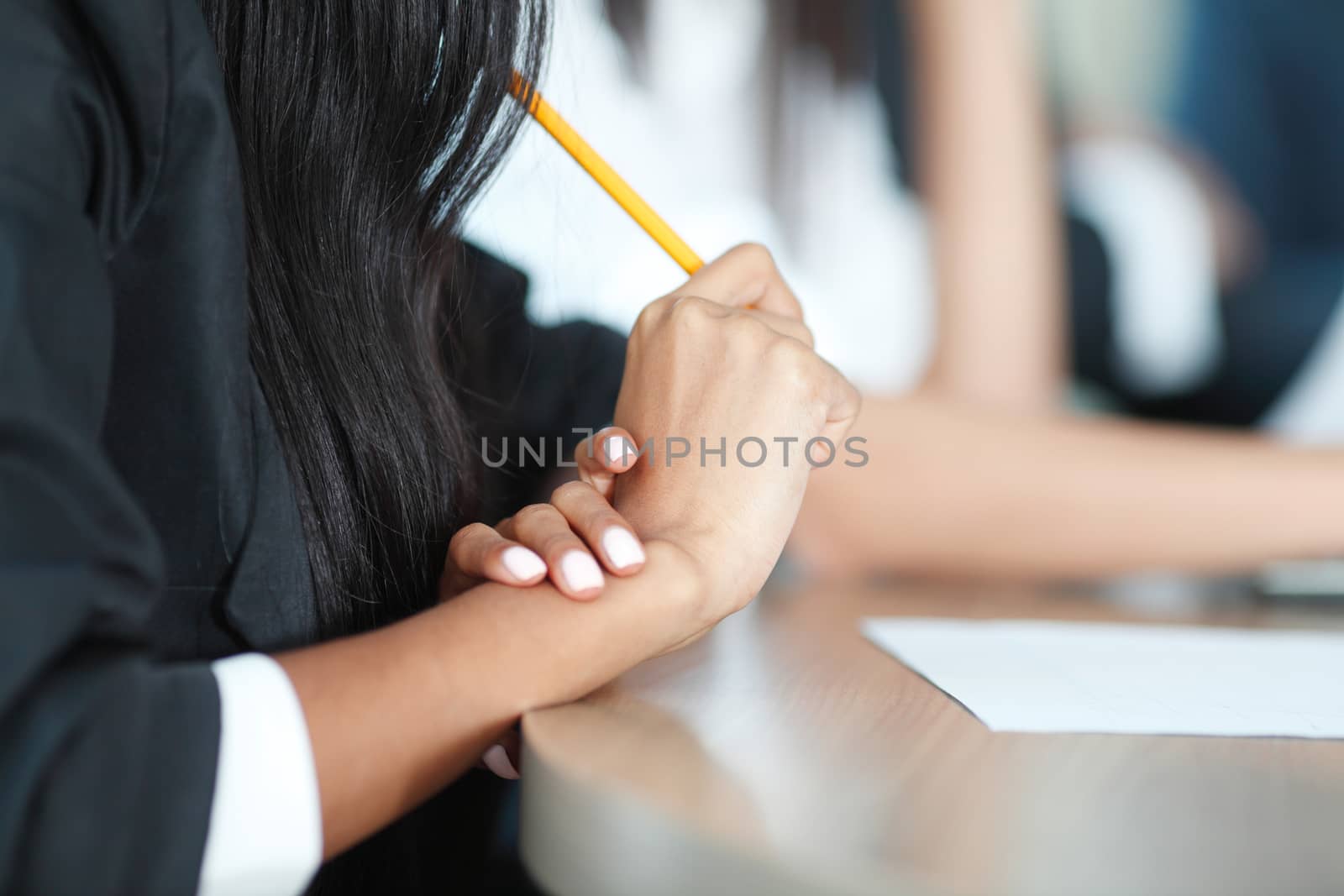 Close-up of Business people working together at a meeting