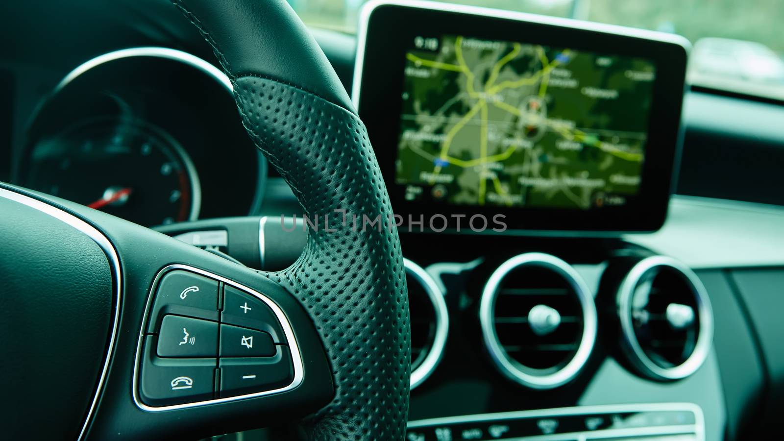 Modern car interior. Shallow DOF. Steering wheel in focus