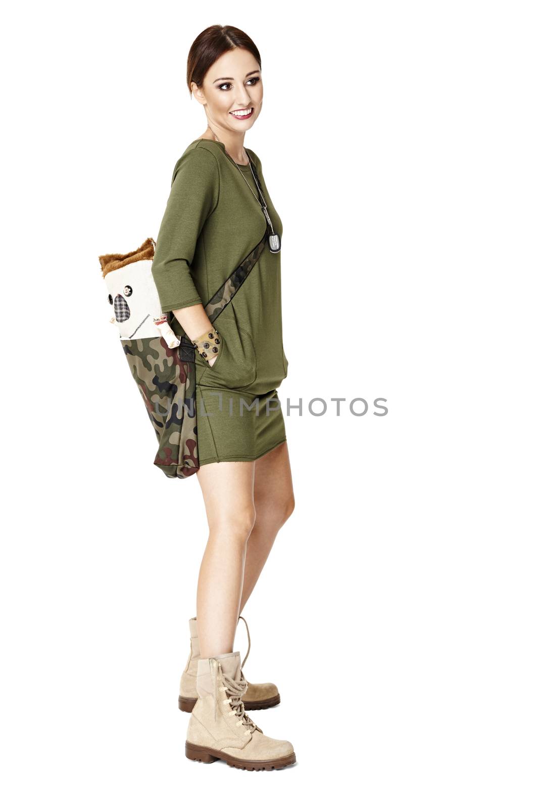 Studio shot of young woman with bag. Isolated one white background. 