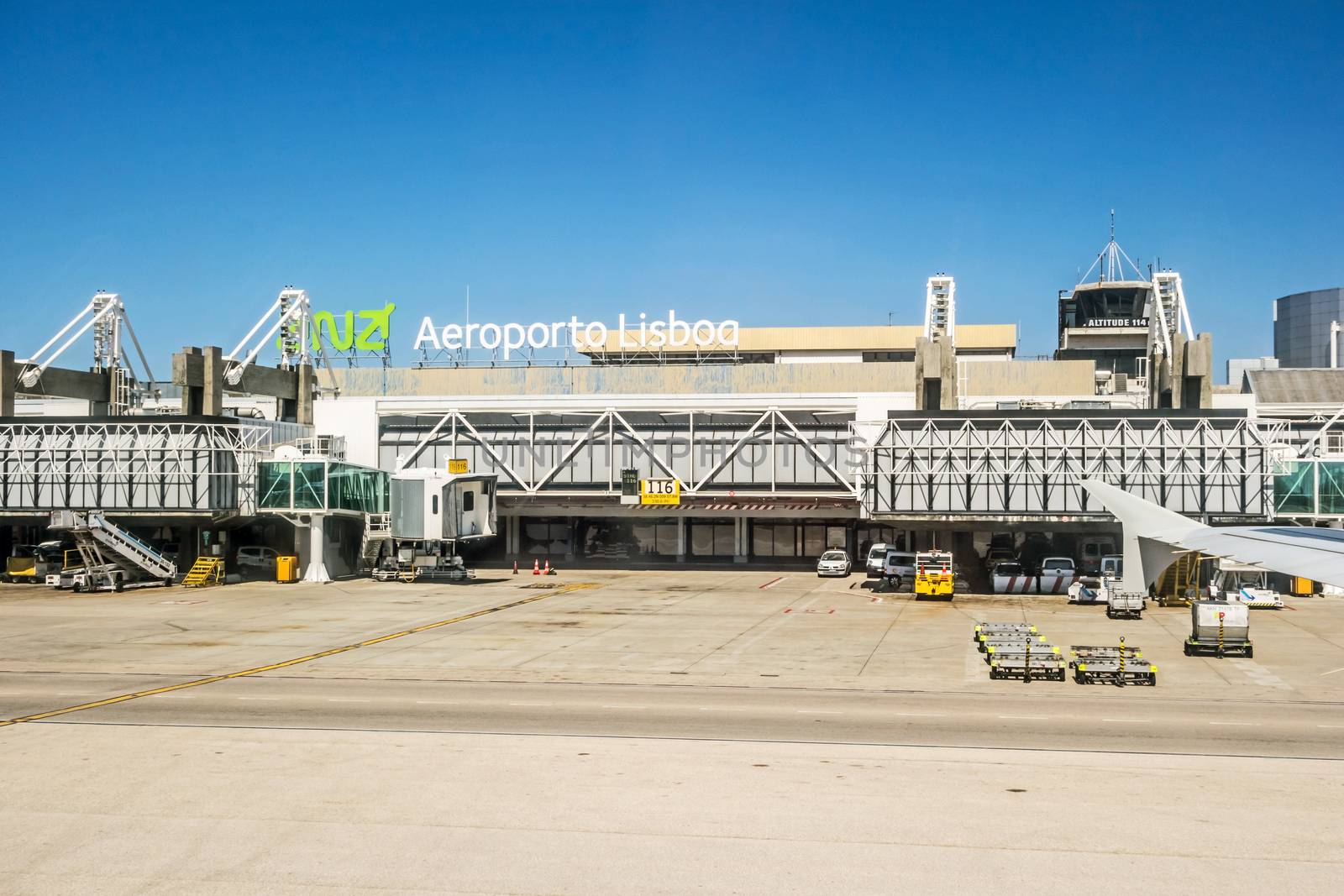 Lisbon, Portugal - May 30, 2013: At the airport of lisbon (Aeroporto Lisboa) after landing. Main gate with tower.