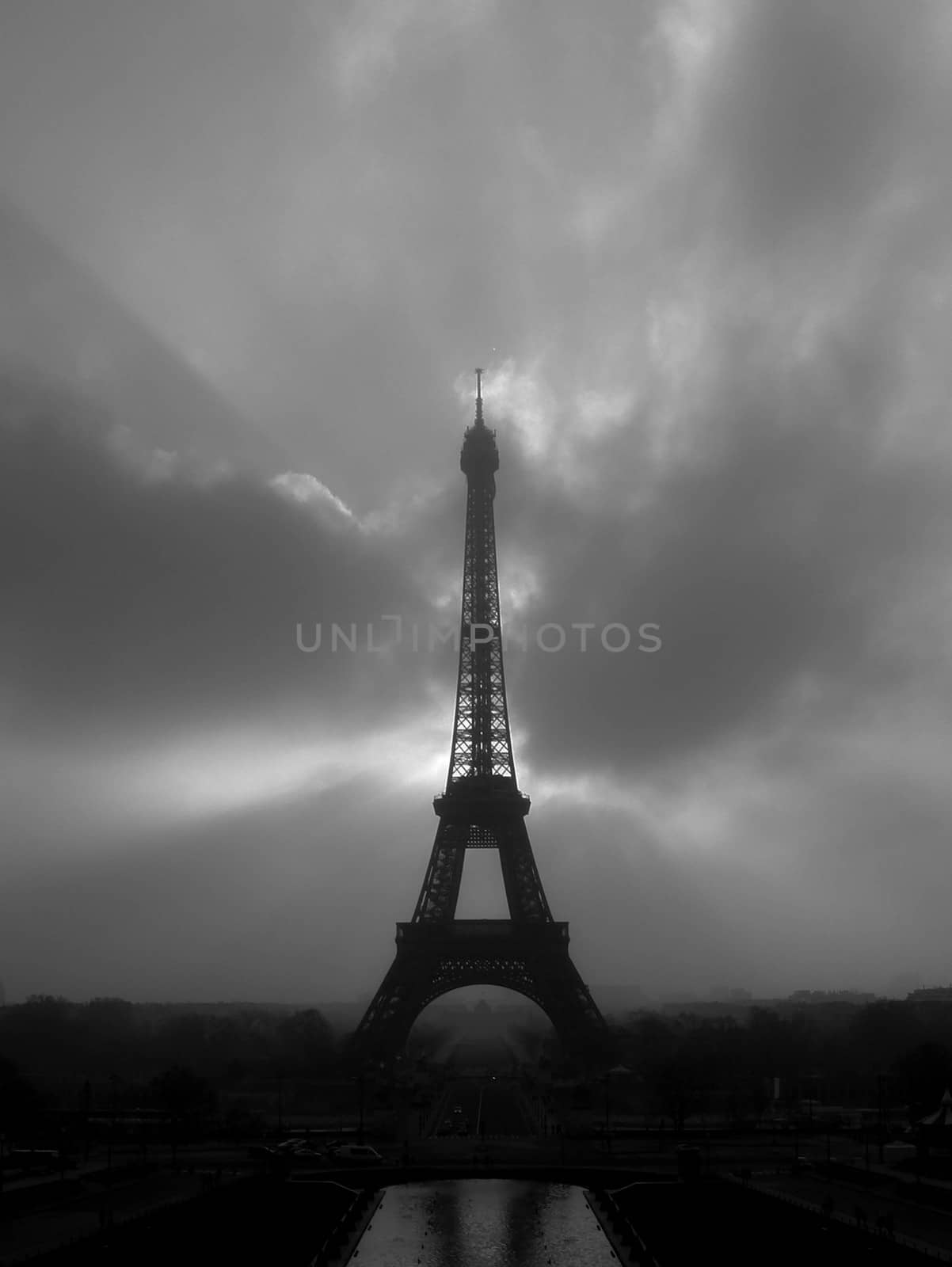 Picture of the Eiffel Tower on a cloudy day.