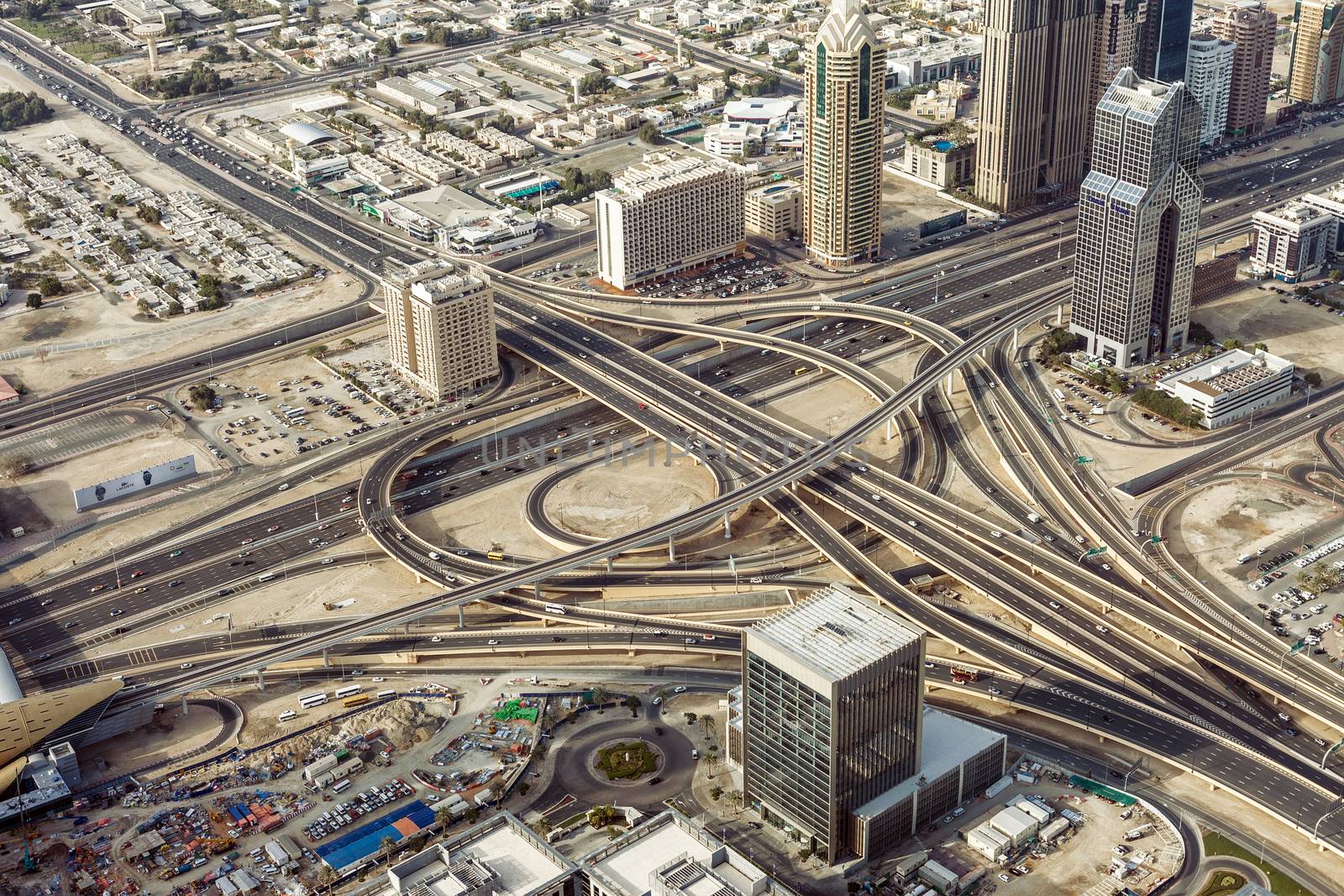 Downtown Dubai. Skyscrapers and road by H2Oshka