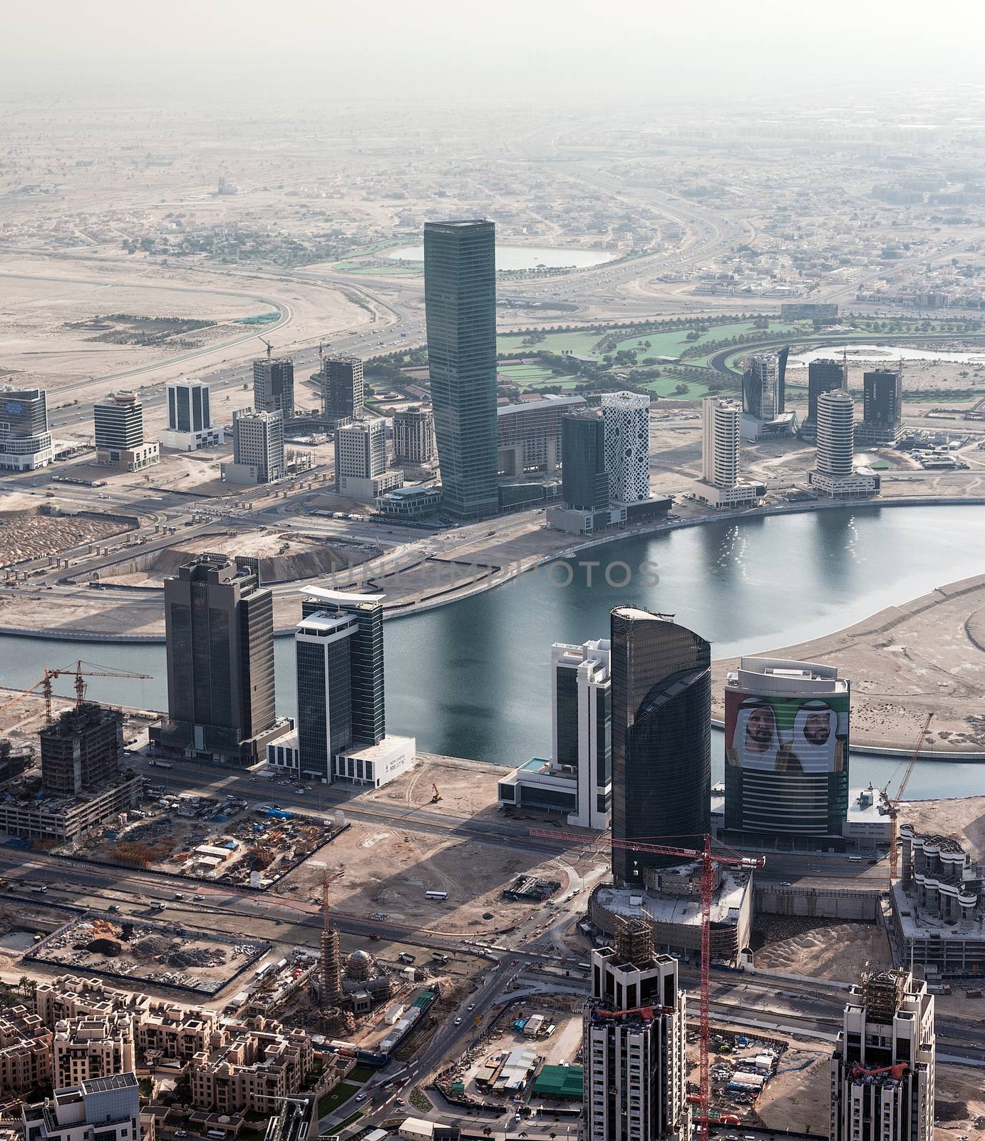 Downtown Dubai. Skyscrapers and road by H2Oshka