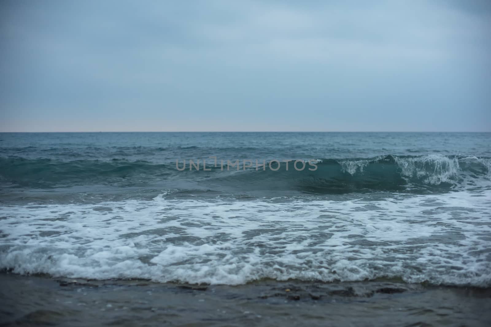 Blue sea with waves and sky