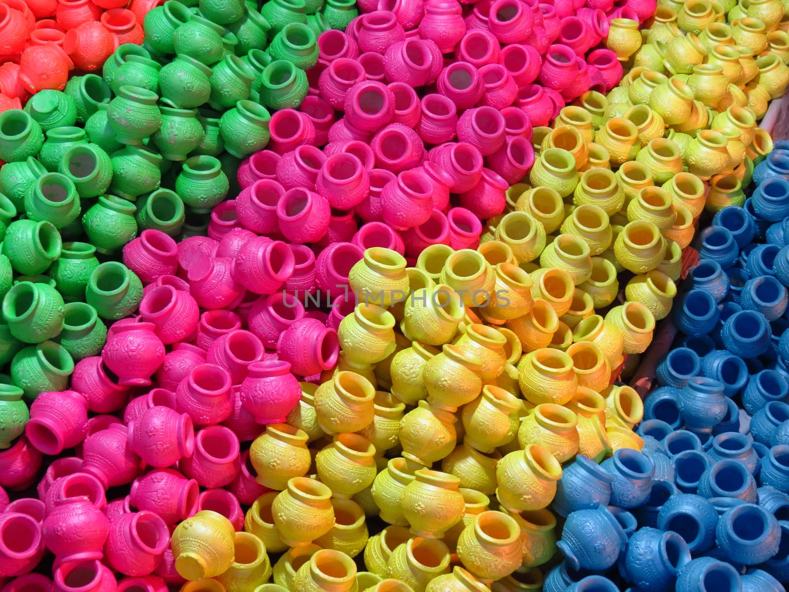A background of colorful pots used for rituals during Diwali festival in India.                               