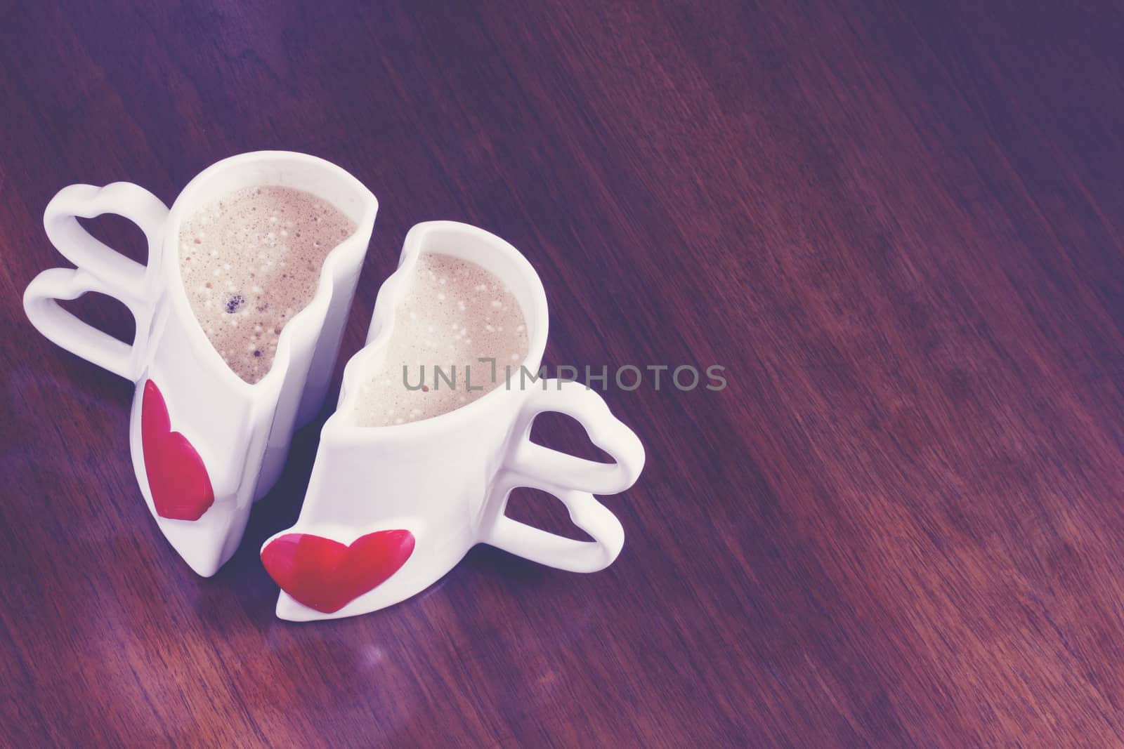 Two cups of coffee in the shape of a heart