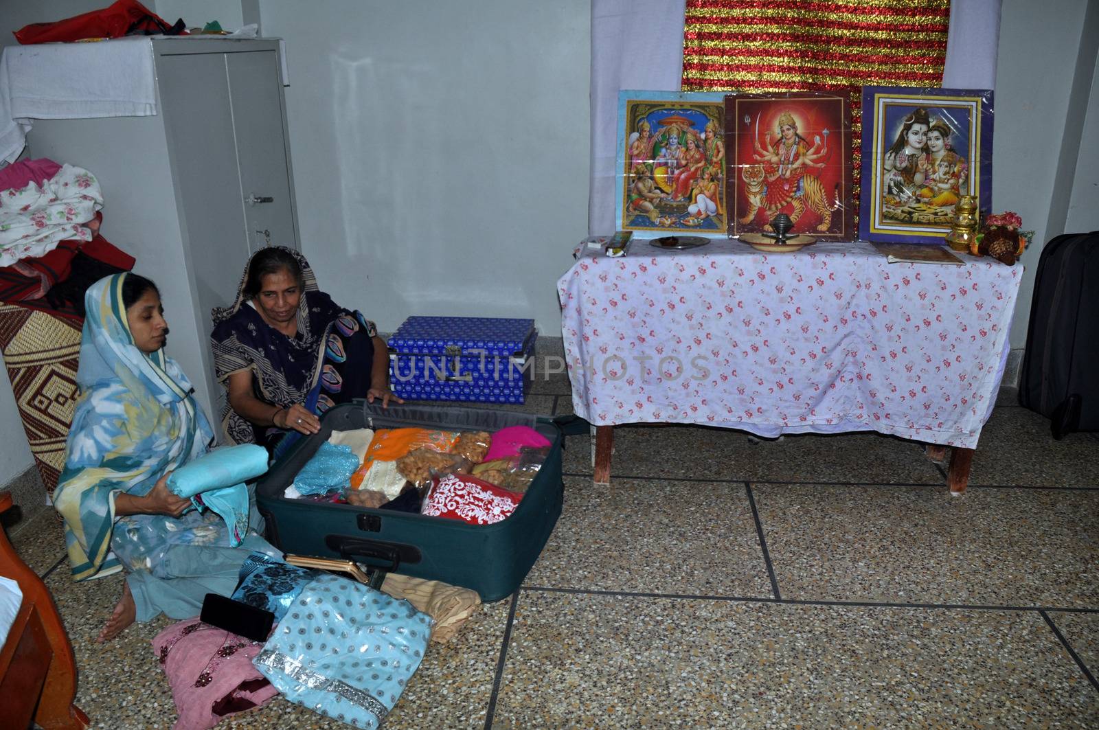 PAKISTAN, Karachi: A 23-year-old Indian woman, who inadvertently crossed the border into Pakistan when she was 11 years old, prepares to return home on October 25, 2015. Geeta, who is deaf and mute, lost her family and has lived in a home for abandoned children run by the Edhi foundation in Karachi.  Her family have been traced in India and she will be reunited with them after a DNA test has been done.
