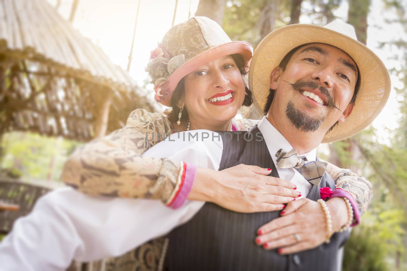 Attractive 1920s Dressed Romantic Couple Flirting Outdoors.