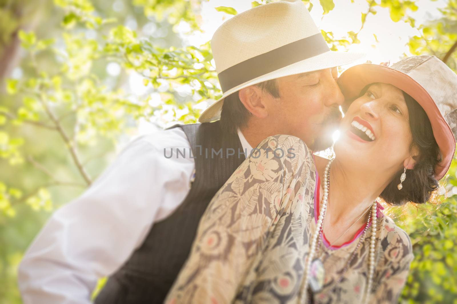 Attractive 1920s Dressed Romantic Couple Flirting Outdoors.