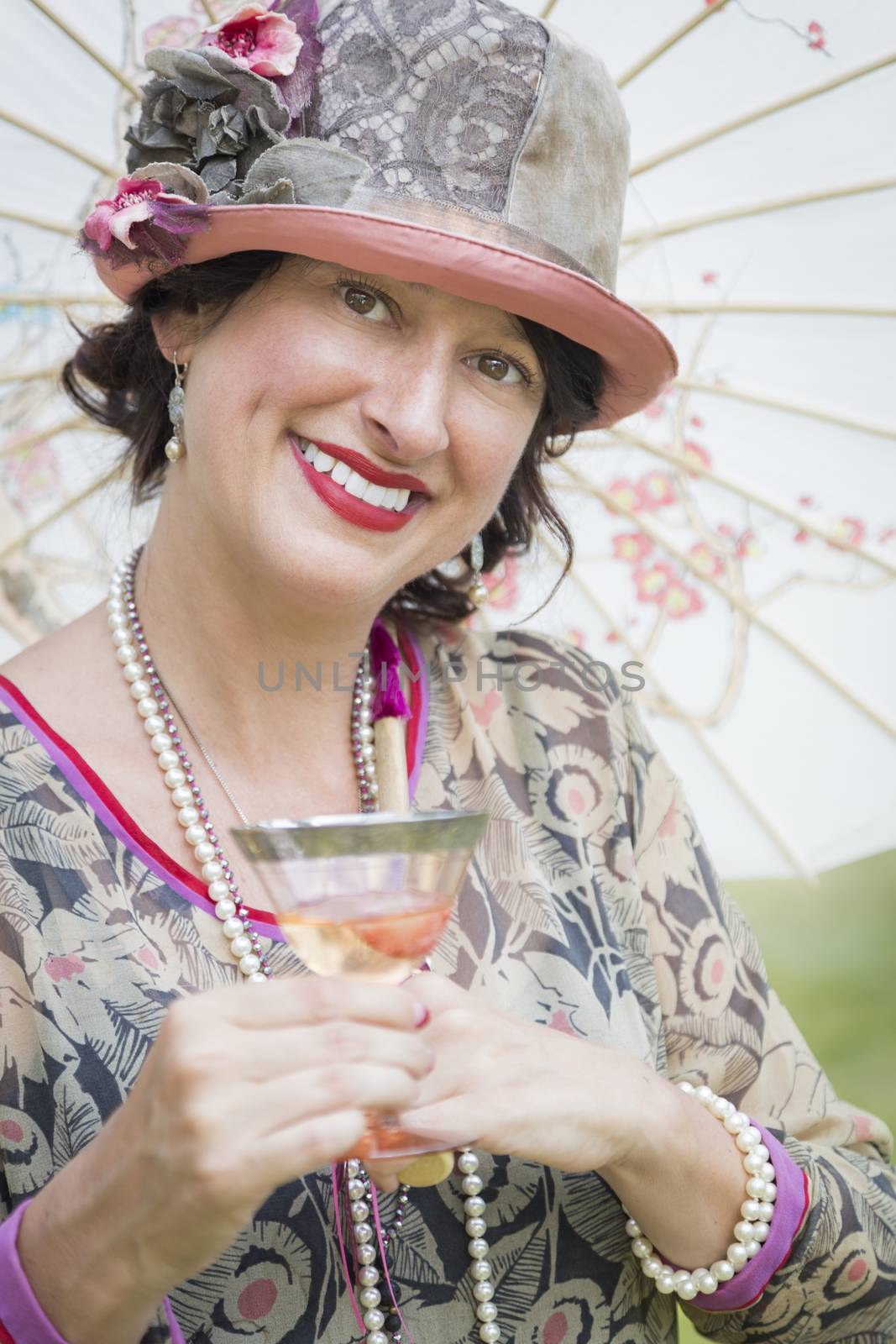 Beautiful 1920s Dressed Girl with Parasol and Glass of Wine Portrait.