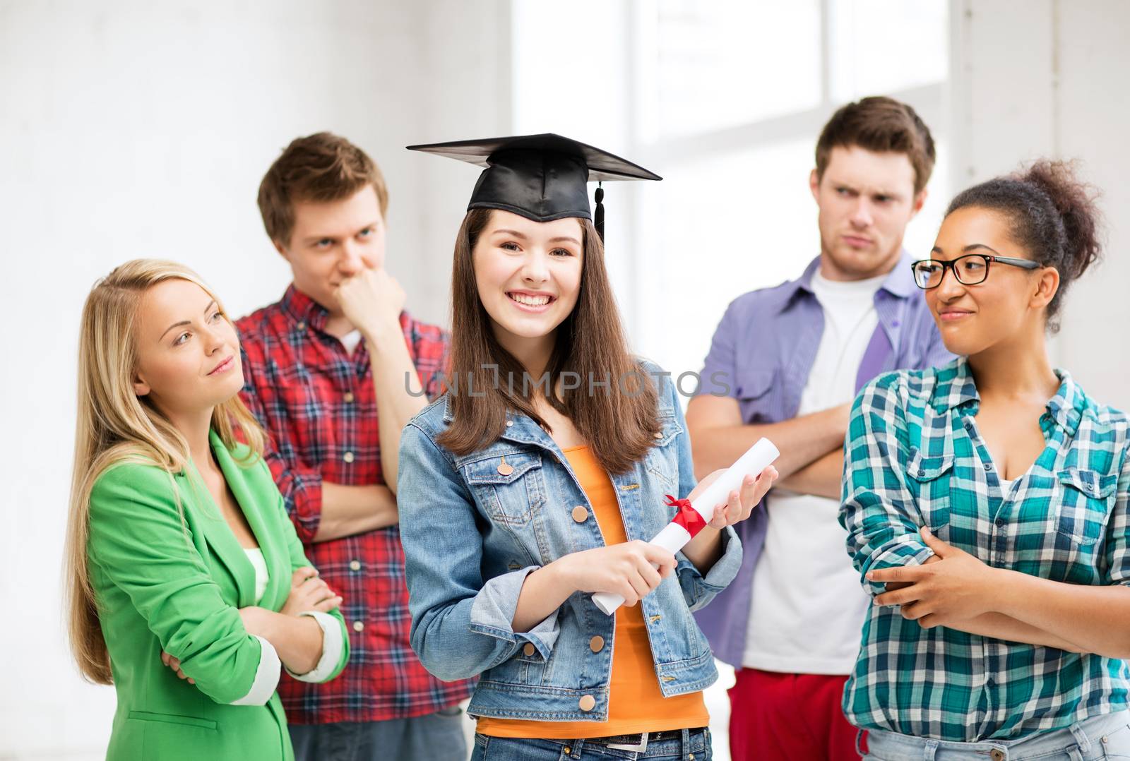 education and competition concept - girl in graduation cap with certificate and students