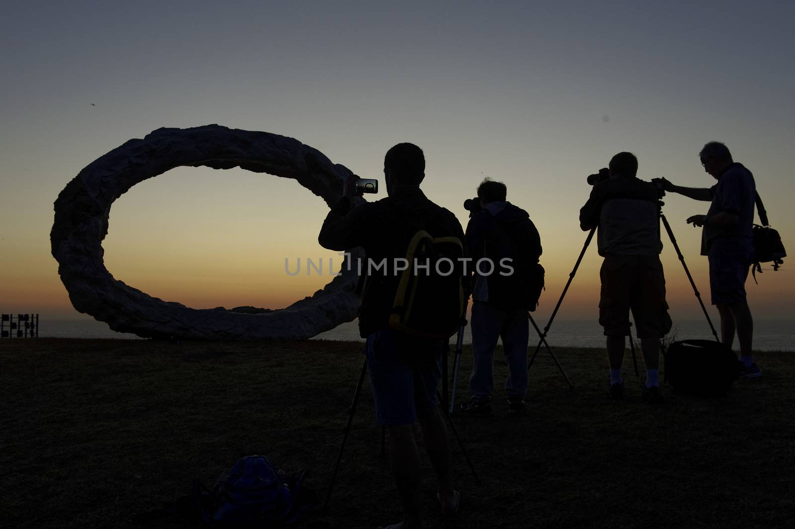 AUSTRALIA, Sydney: The Sculpture by the Sea exhibition in Sydney is photographed here on October 26, 2015 as the sun rises. The sculptures can be seen between Bondi and Tamarama and runs from October 22 to November 8, 2015. Artist: Peter Lundberg