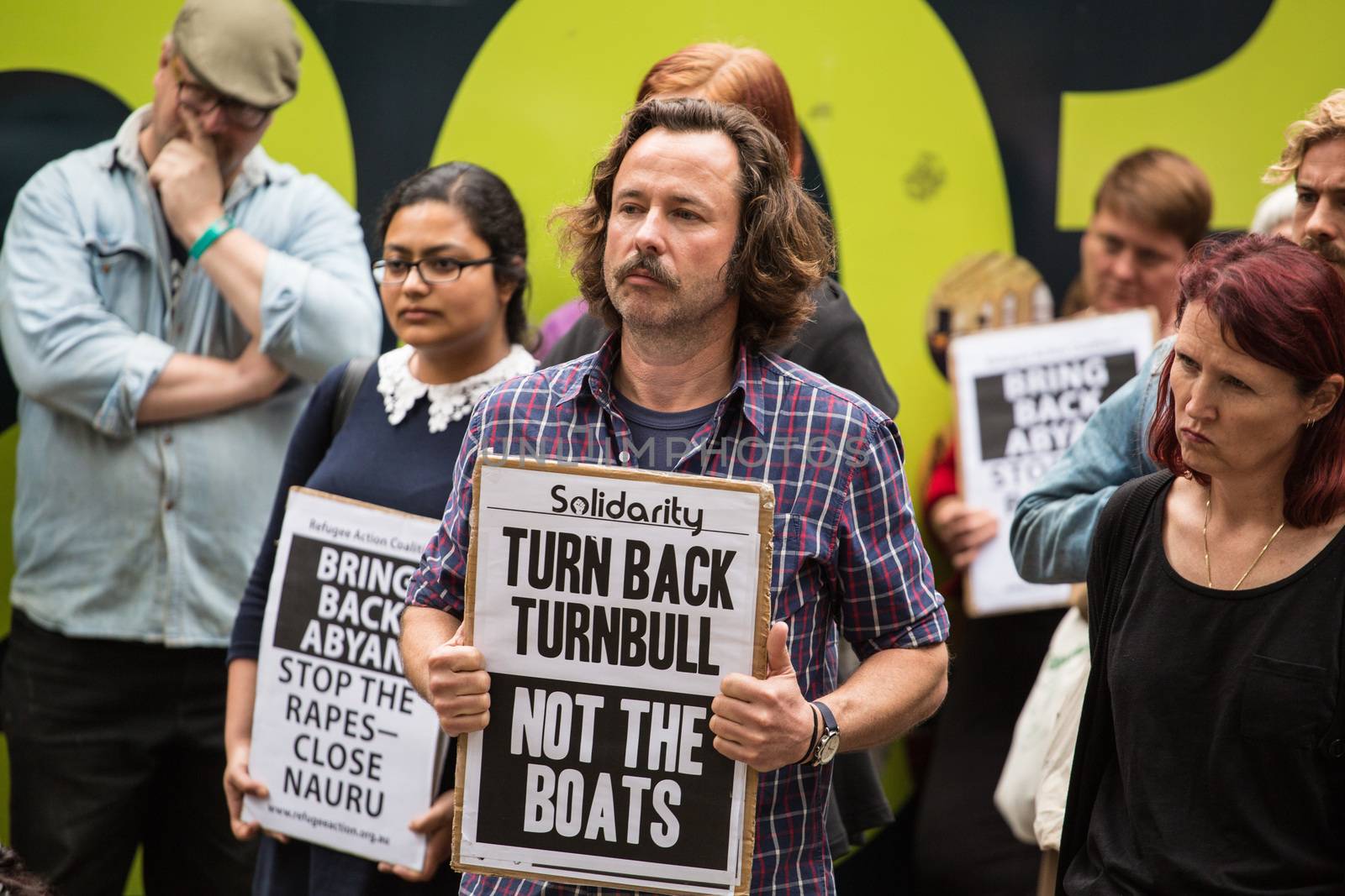 AUSTRALIA, Sydney: Supporters of a Somali refugee known as Abyan rally in her defence at Town Hall Square in Sydney on October 23, 2015. After allegedly being raped at Nauru detention center, Abyan was flown to Australia to have an abortion, which she was then reportedly denied before being deported back to Nauru. Immigration Minister Peter Dutton has said that Abyan changed her mind about the abortion, and upon her request could be flown back to Australia for the procedure.