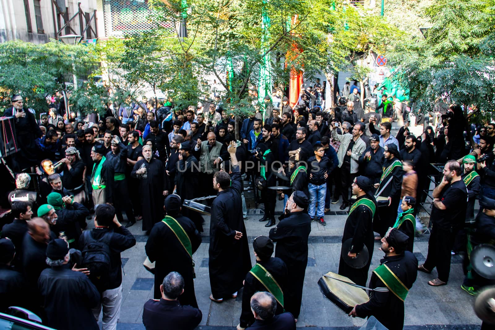IRAN, Tehran: Iraqis living in Iran gathered to mourn in front of the Grand Bazaar in Tehran, Iran on October 23, 2015.Worshipers in these photos celebrate the Ashura, or tenth day of Muharram. Muharram is the first month in the Islamic calendar and the Ashura marks the day that the grandson of the Prophet Mohammad's grandson, Imam Hussein, was killed. 