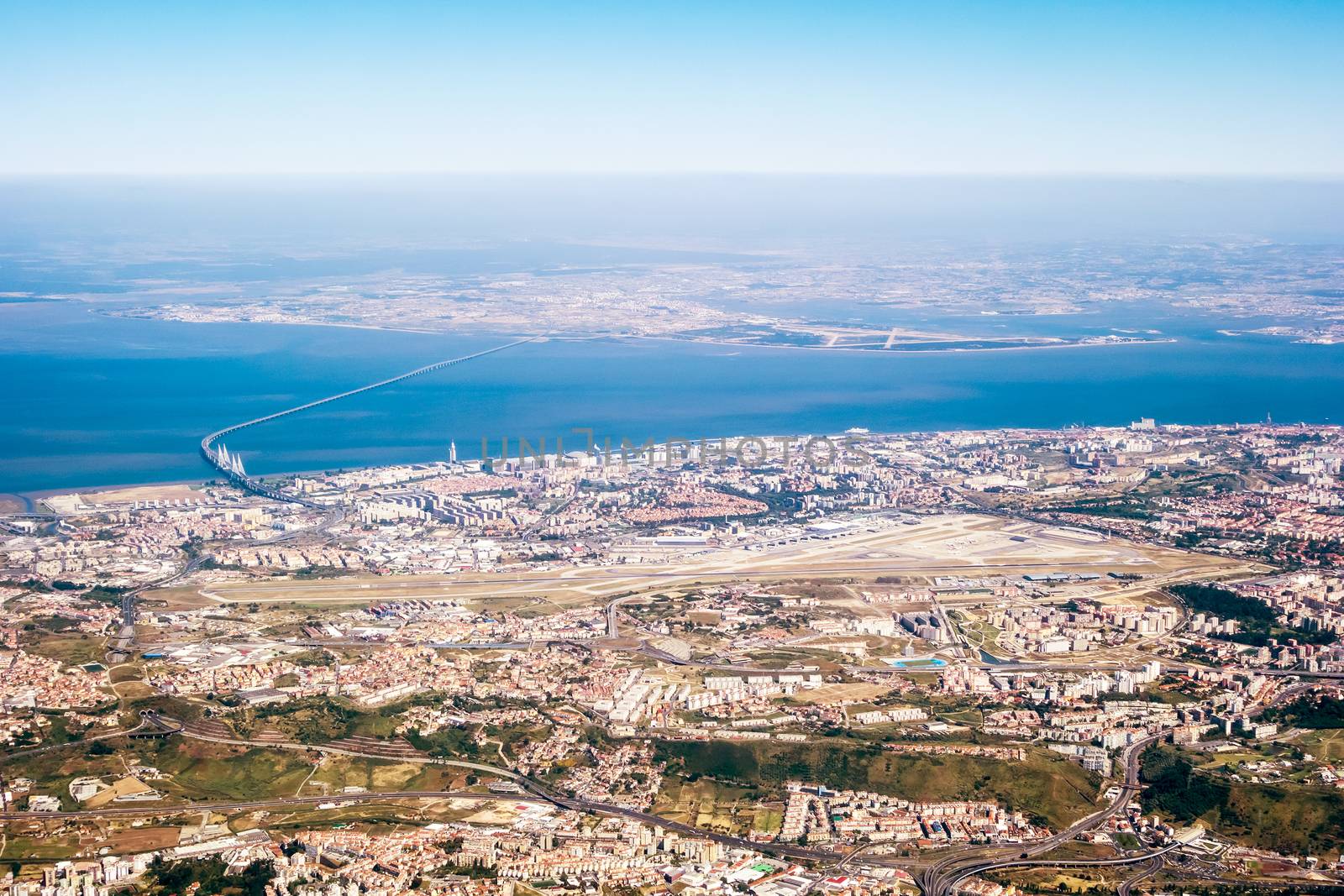 View over Lisbon - airport and river Tejo with bridge Ponte Vasco da Gama