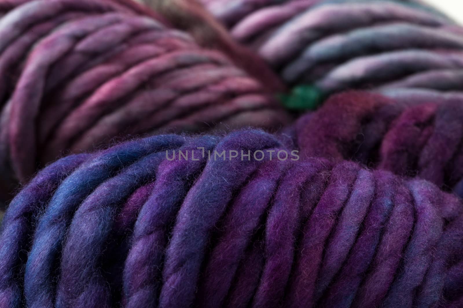 Set of colorful wool yarn balls. Closeup photo.