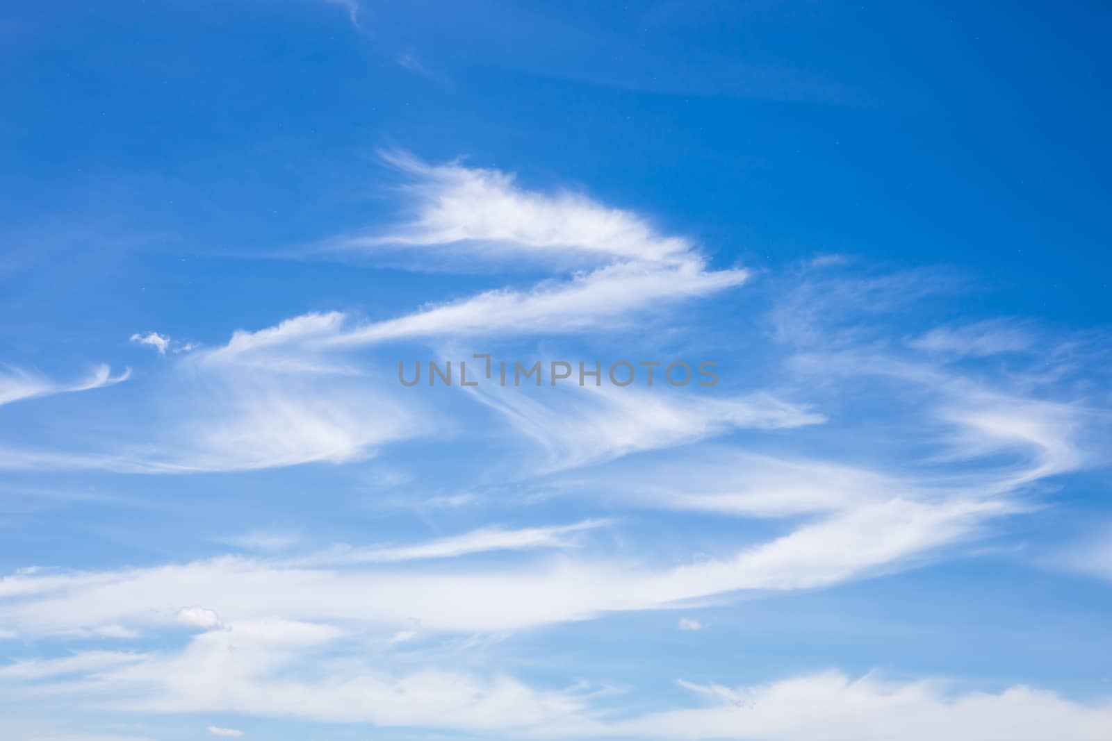 blue sky background with wave clouds