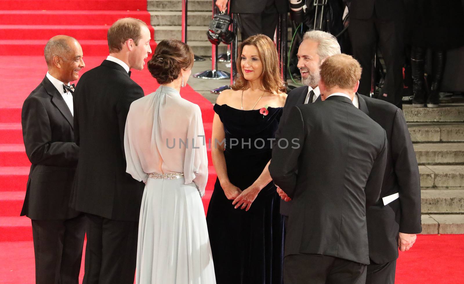UNITED KINGDOM, London: Prince William, Duke of Cambridge, Catherine, Duchess of Cambridge and Prince Harry speak to Barbara Broccoli and Sam Mendes at the world premiere of the latest Bond film, Spectre, at Royal Albert Hall in London on October 26, 2015.