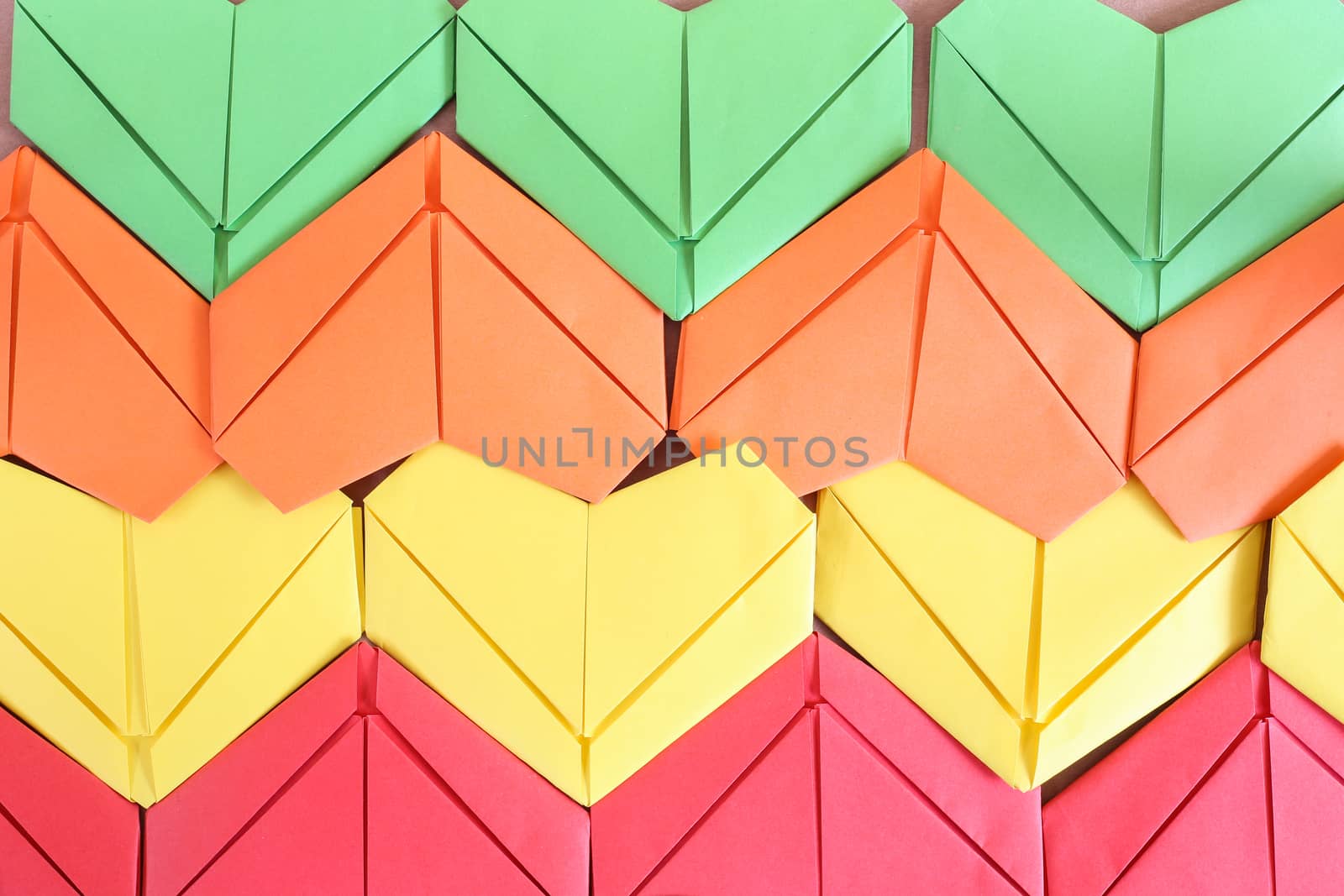 Colorful paper heart background by powerbeephoto