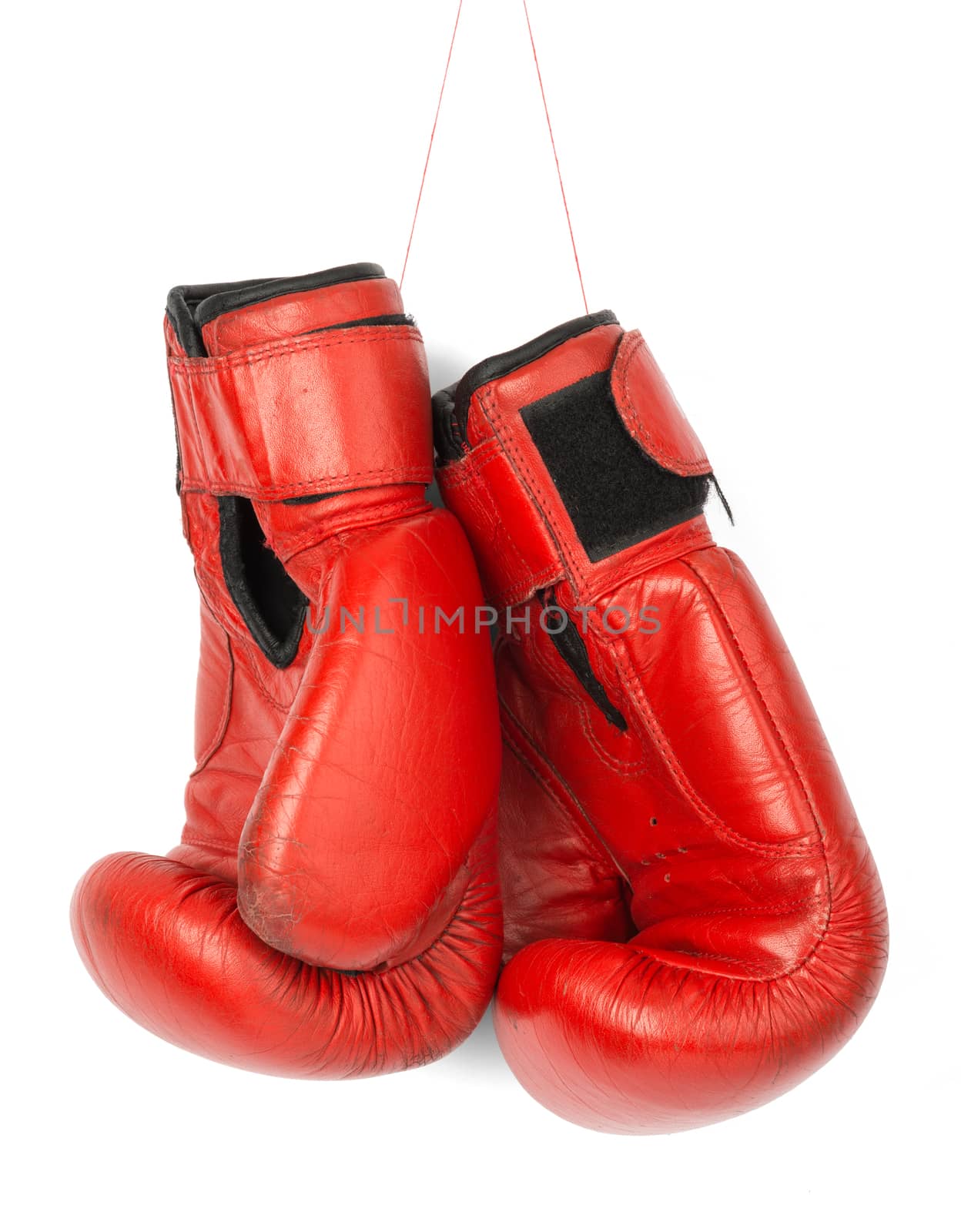 Red boxing gloves on isolated white background