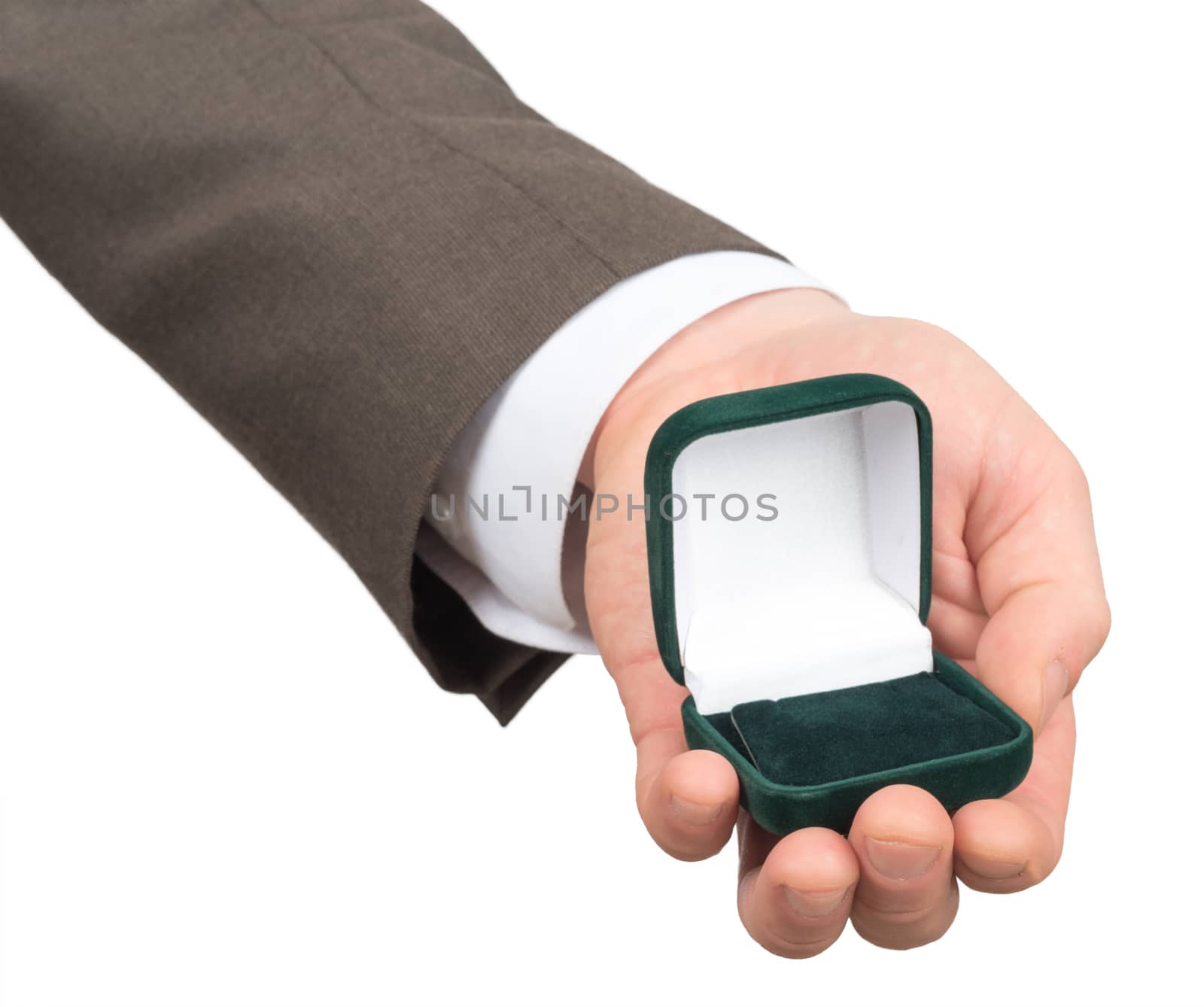 Open empty ring box in businessmans hand by cherezoff