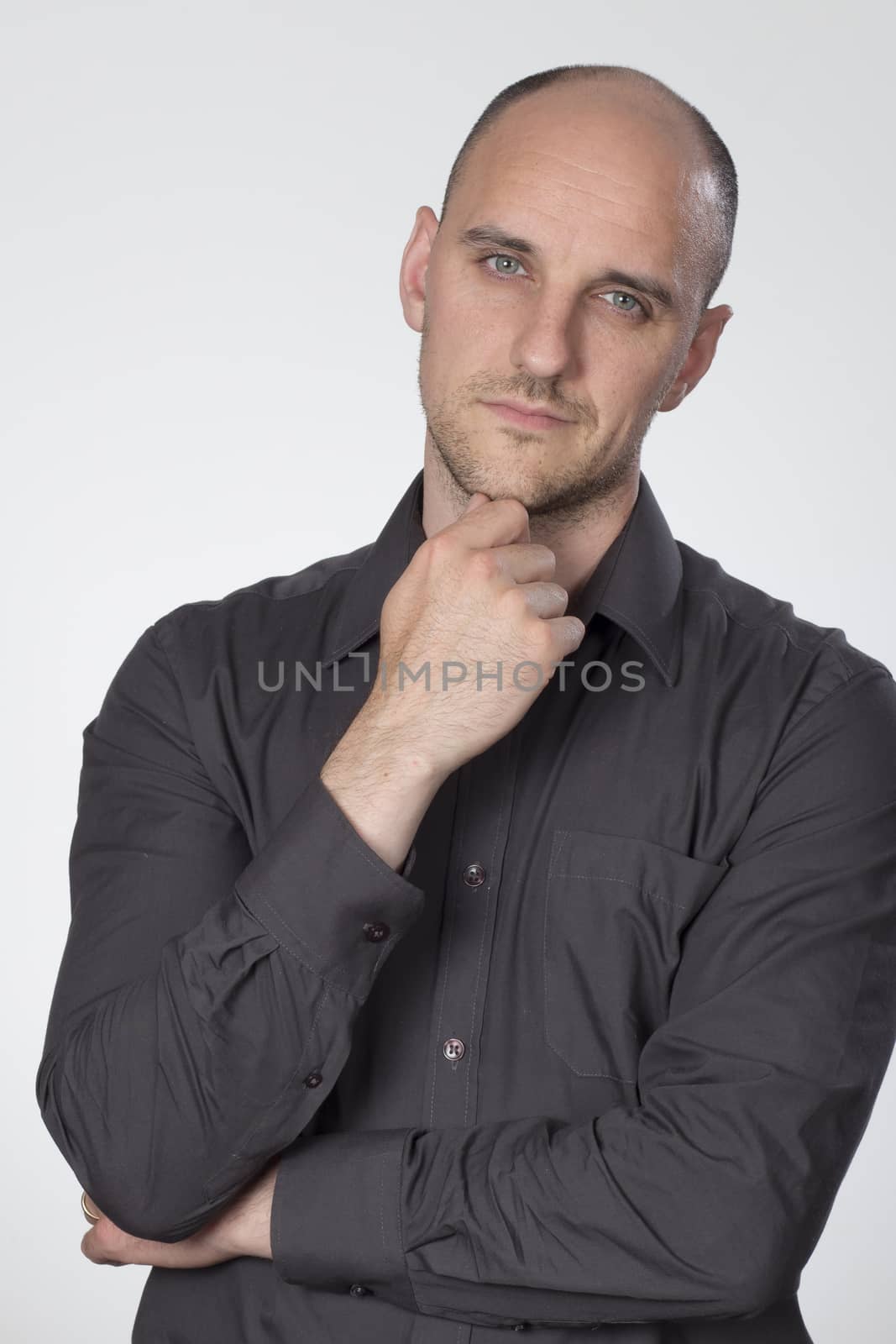 Man in shirt looking at camera