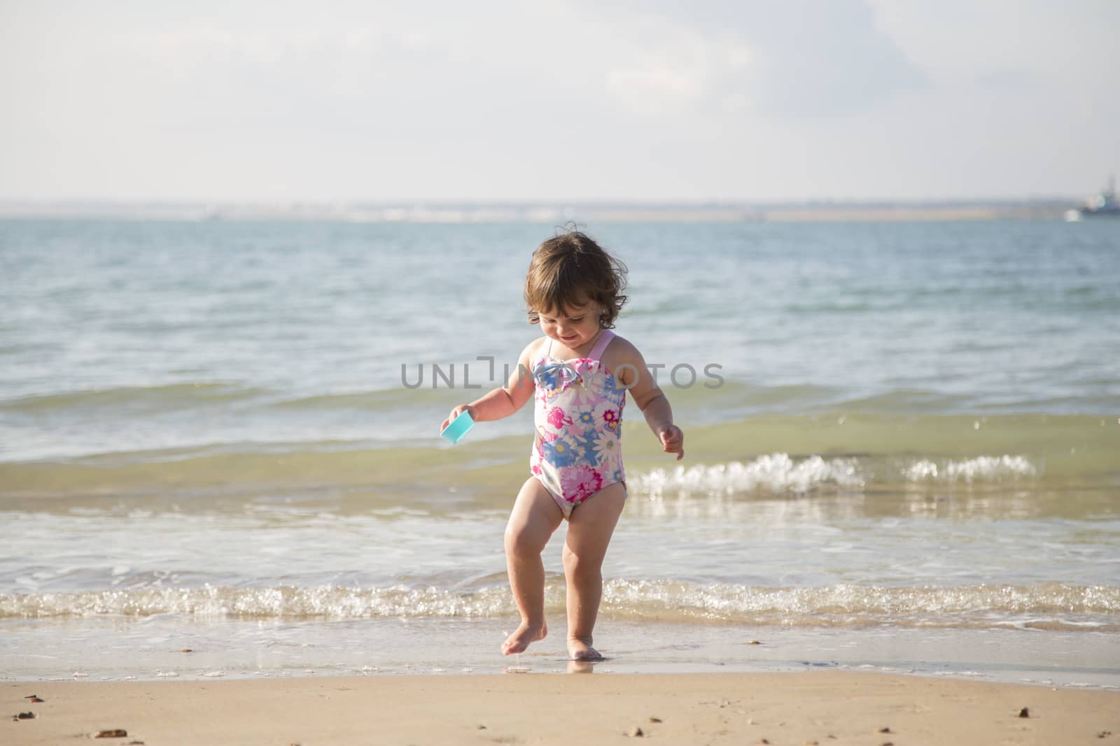 Infant on beach by mattkusb