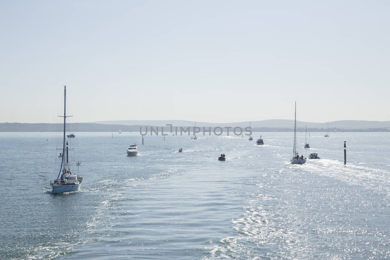 Boat traveling into harbor by mattkusb