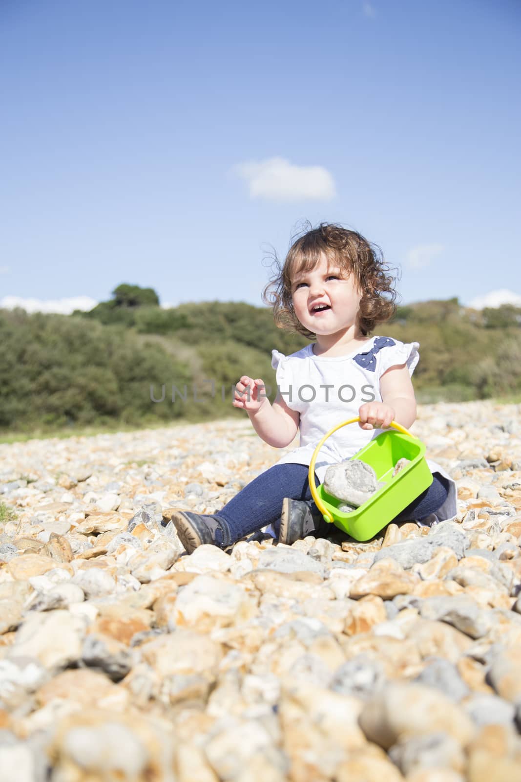 Sitting on a pebble beach