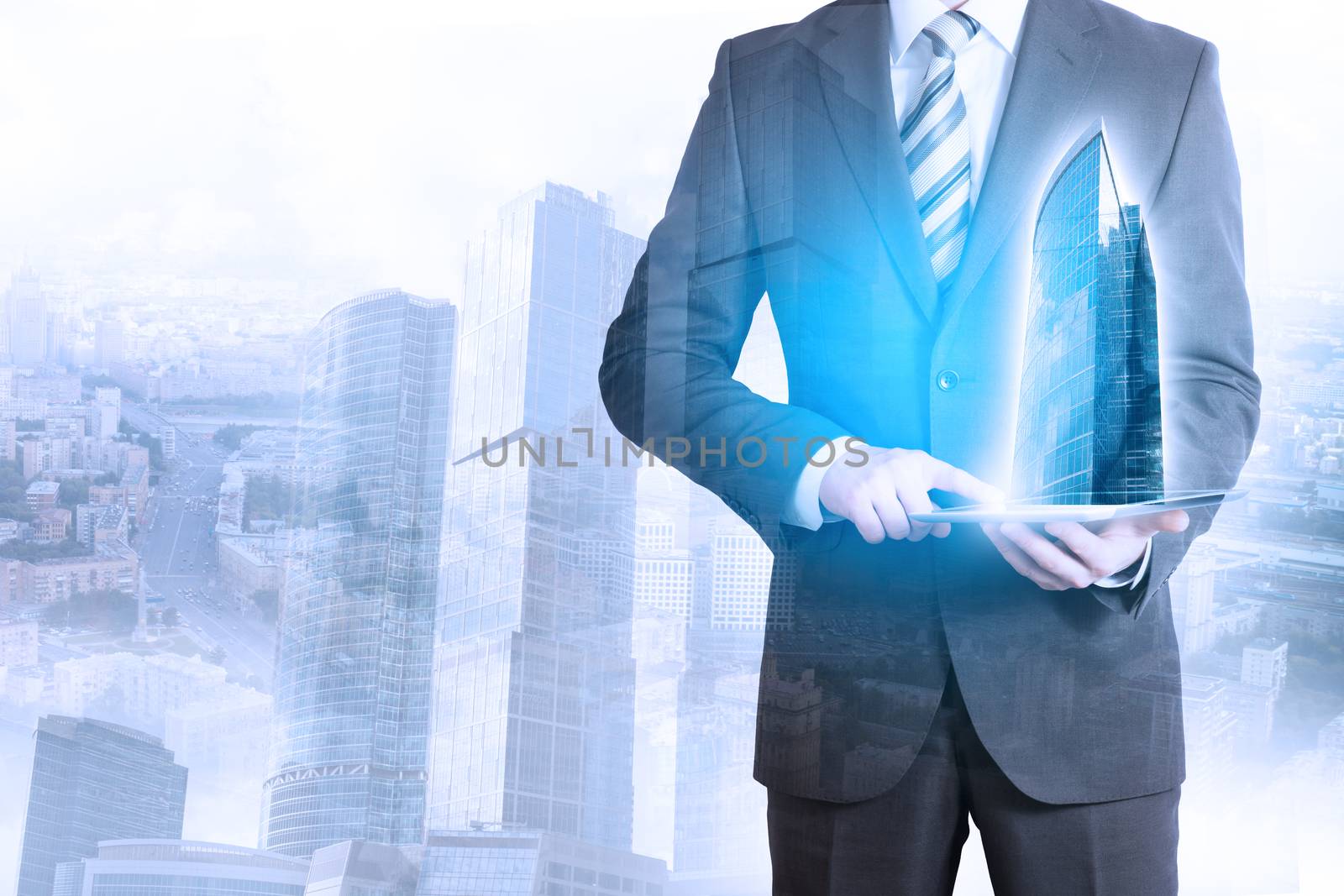 Businessman touching tablet with 3d city model on cityscape background