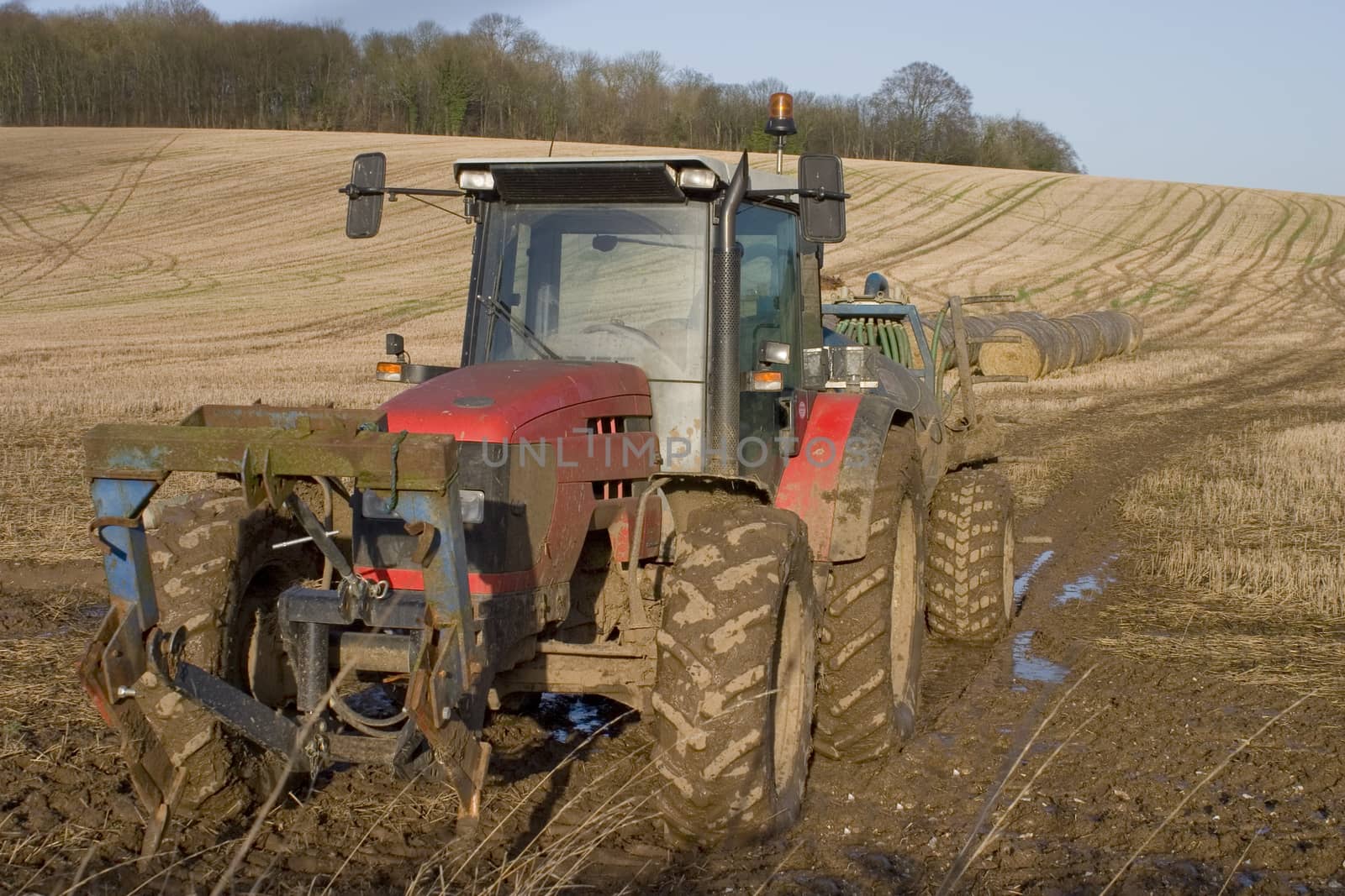 Muddy Red Tractor