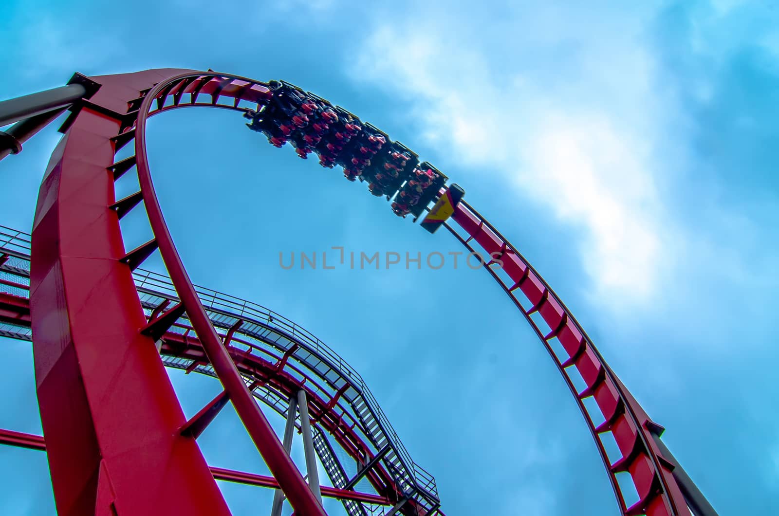 crazy rollercoaster rides at amusement park by digidreamgrafix