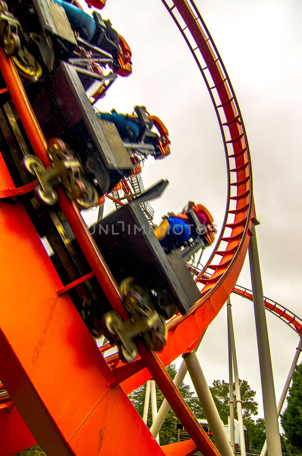 crazy rollercoaster rides at amusement park by digidreamgrafix