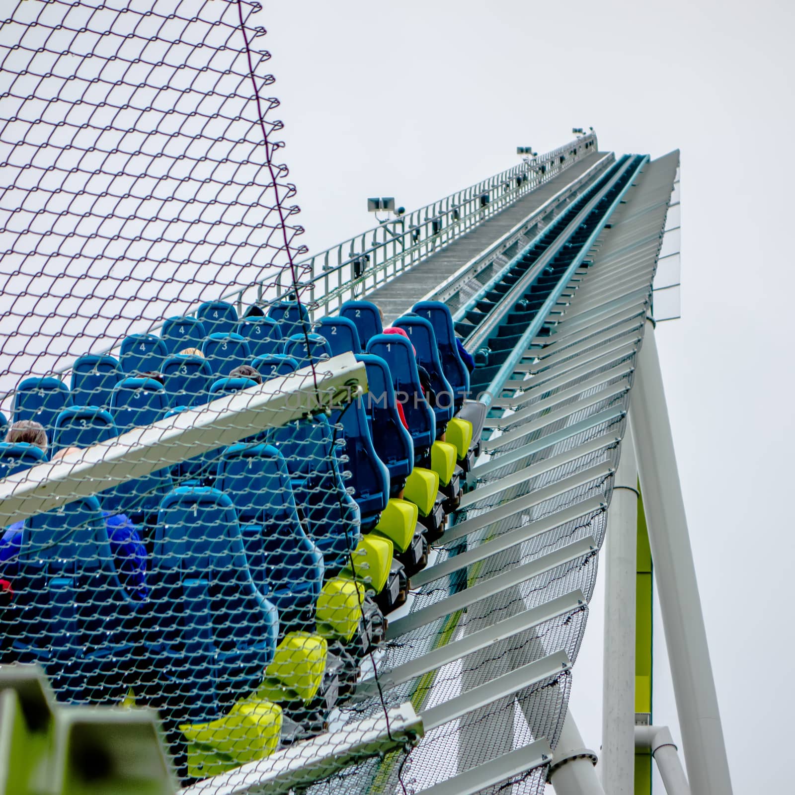 crazy rollercoaster rides at amusement park by digidreamgrafix