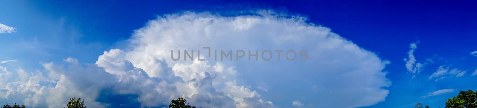 panorama of a cumulous cloud on blue sky